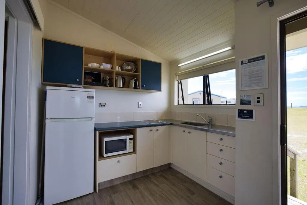 Kitchen or kitchenette in Tasman Holiday Parks - Papamoa Beach