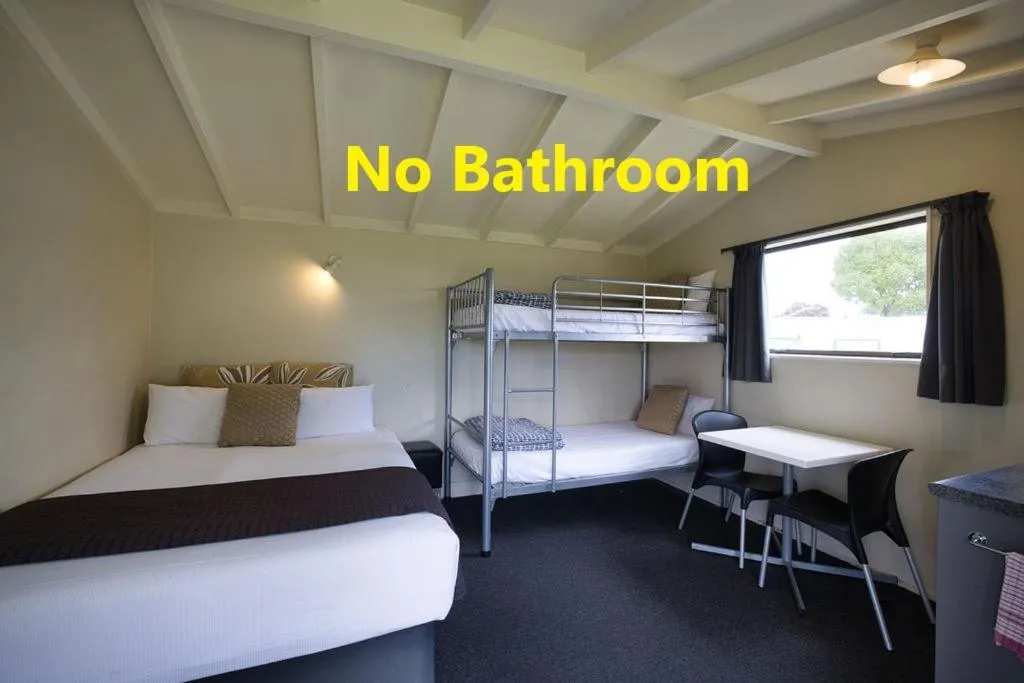 Photo of the whole room, Bed in Tasman Holiday Parks - Papamoa Beach