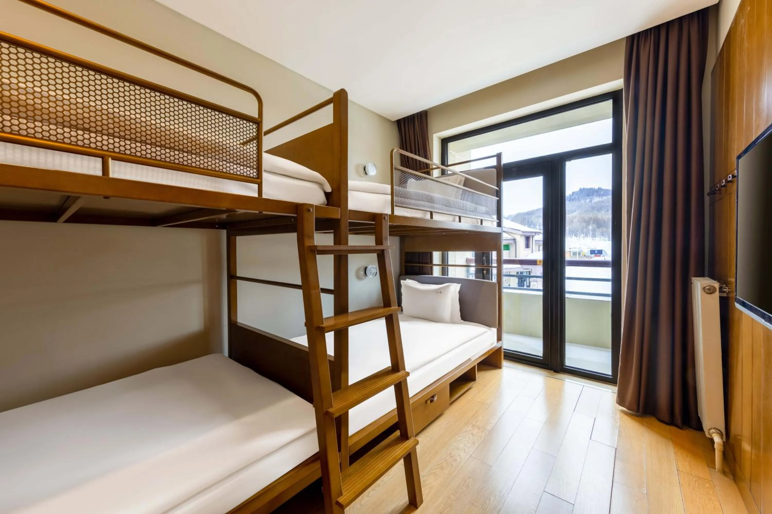 Bed in Wanda Jin Suites Changbaishan