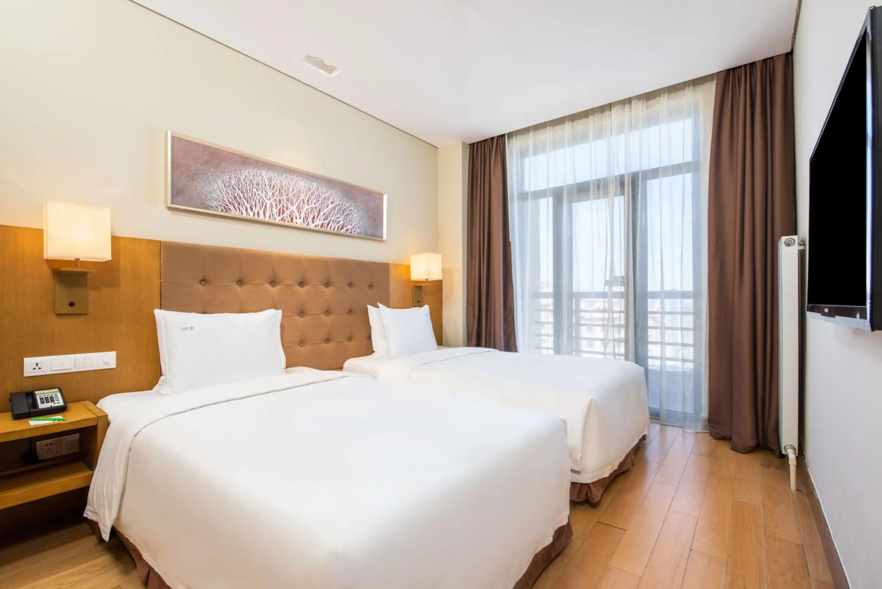 Bed in Wanda Jin Suites Changbaishan