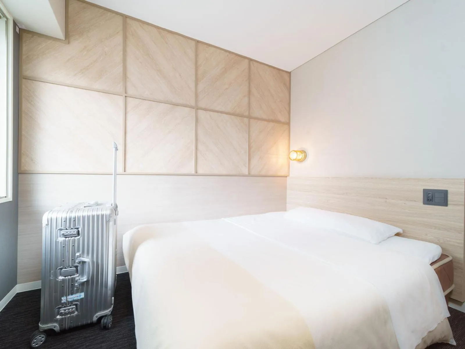 Bed in Super Hotel Midosujisen Esaka