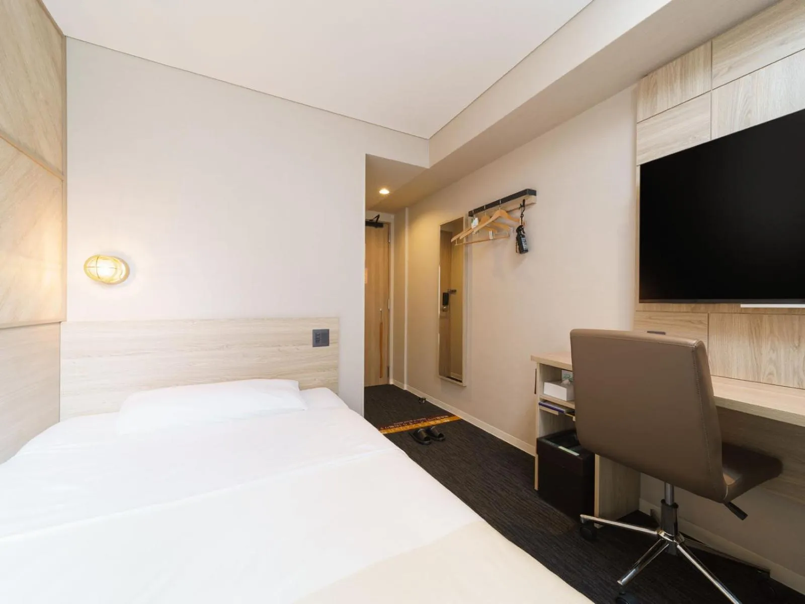 Bed in Super Hotel Midosujisen Esaka