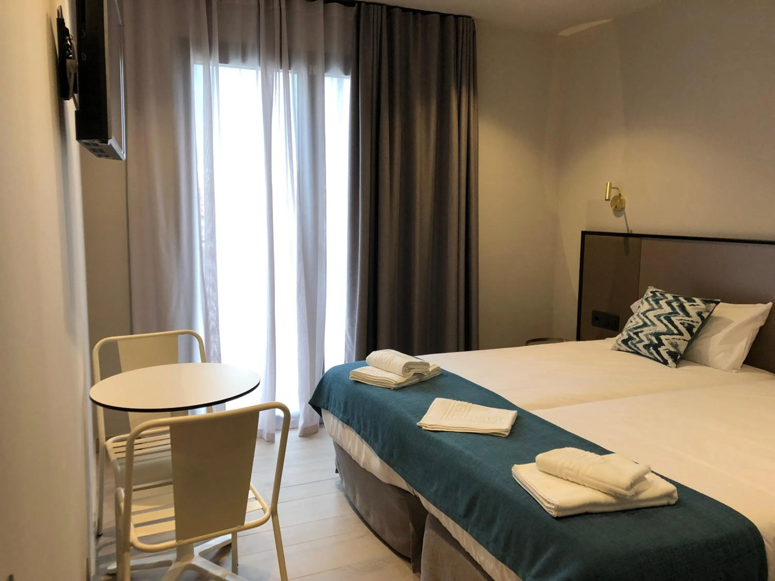 Bed in HOTEL TORRENT