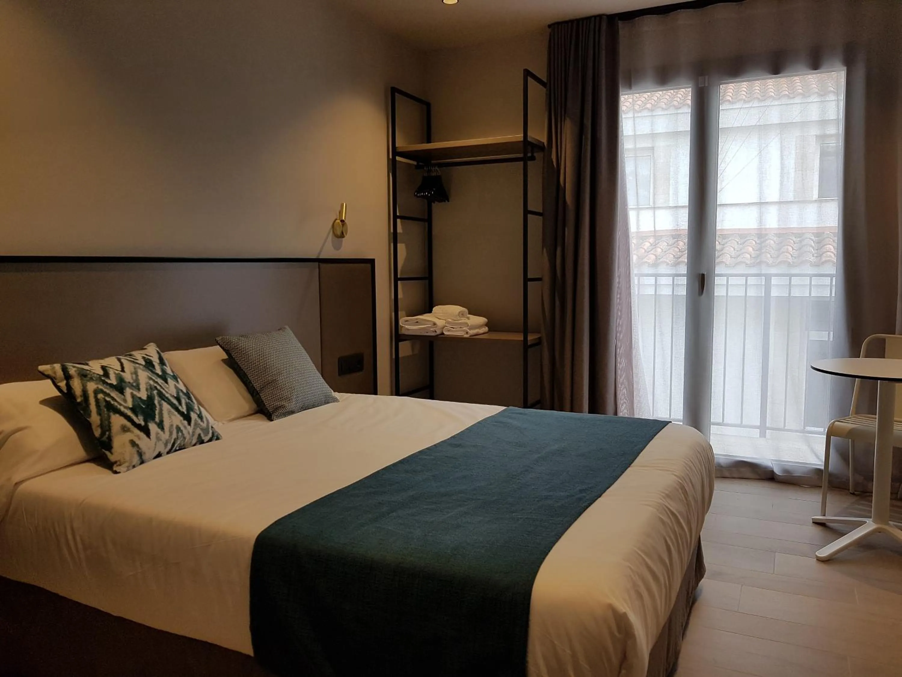 Bed in HOTEL TORRENT