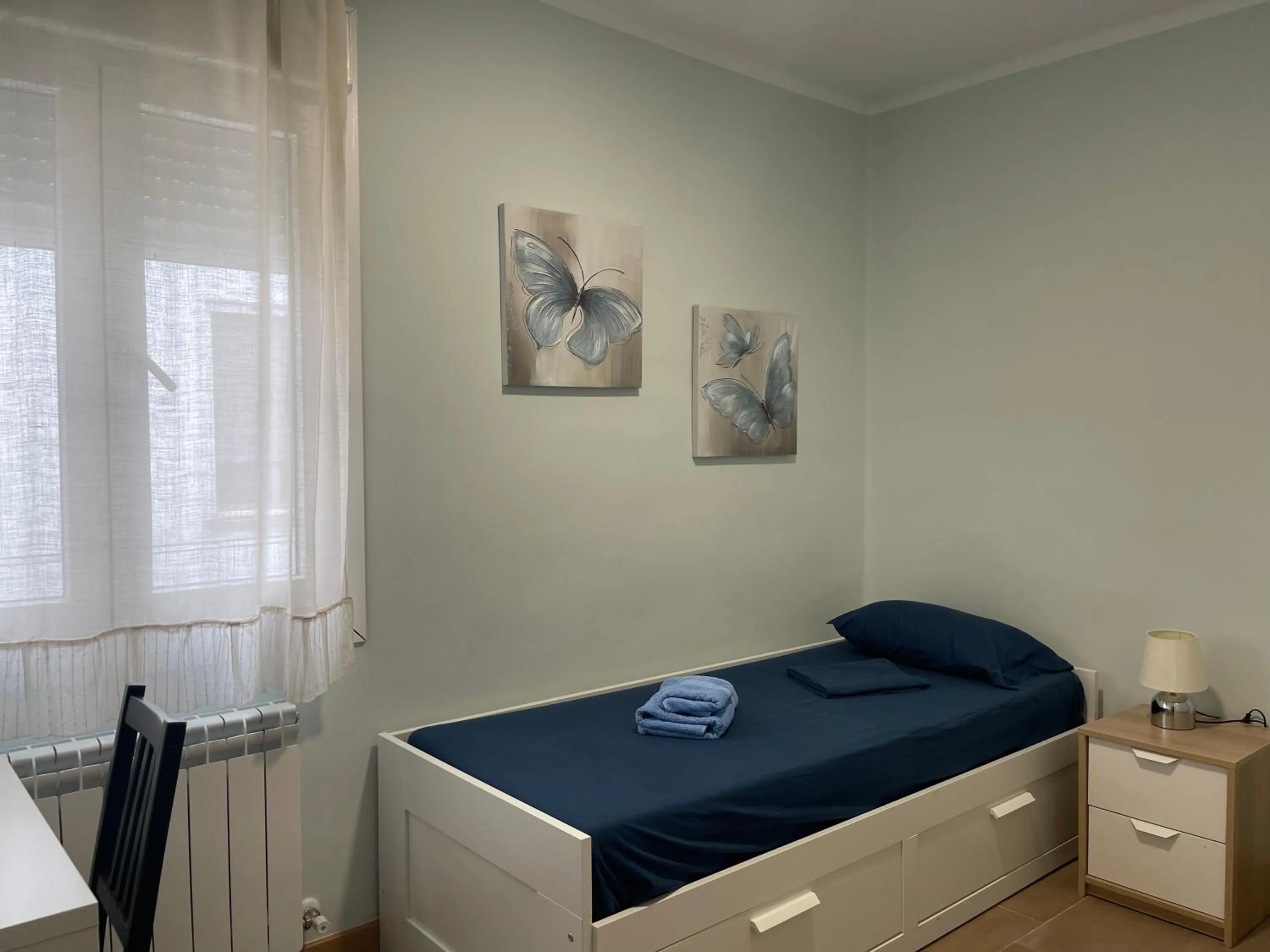 Bed in La Encina Azul Rooms-Grupo Rosa Azul