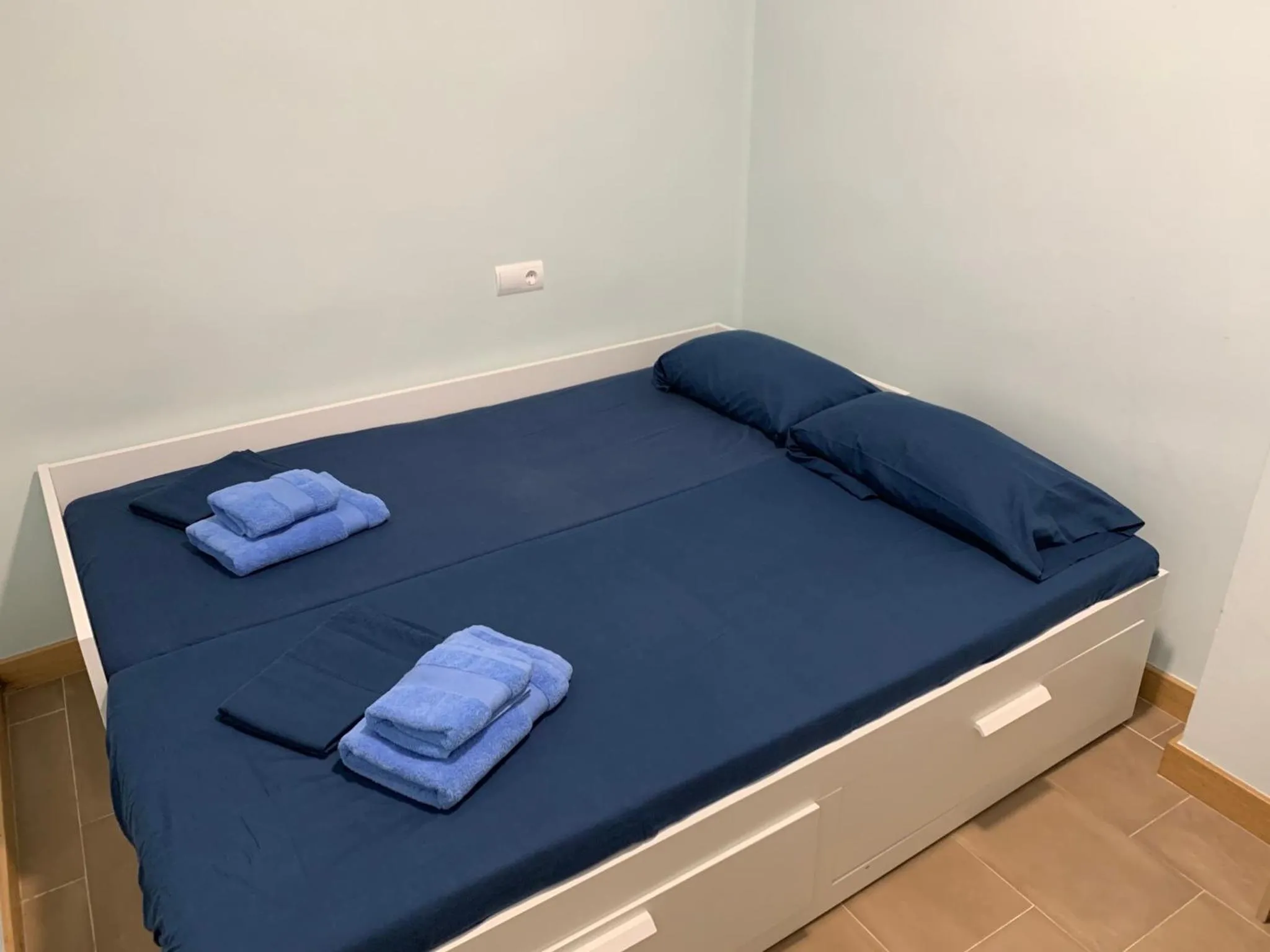 Bed in La Encina Azul Rooms-Grupo Rosa Azul