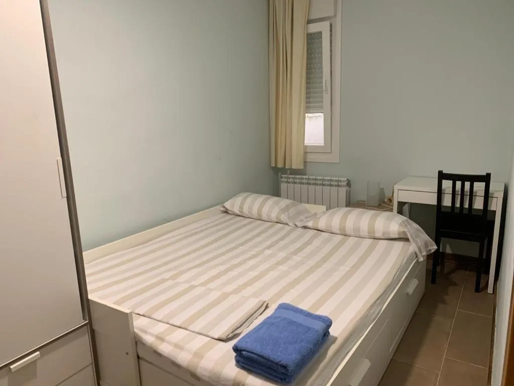 Bed in La Encina Azul Rooms-Grupo Rosa Azul