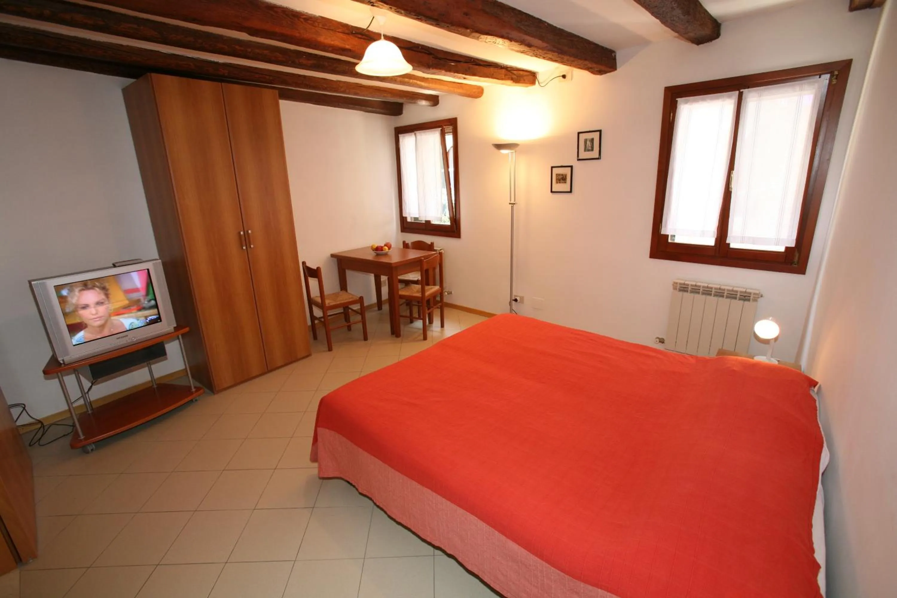 Photo of the whole room, Bed in B&B Giardini