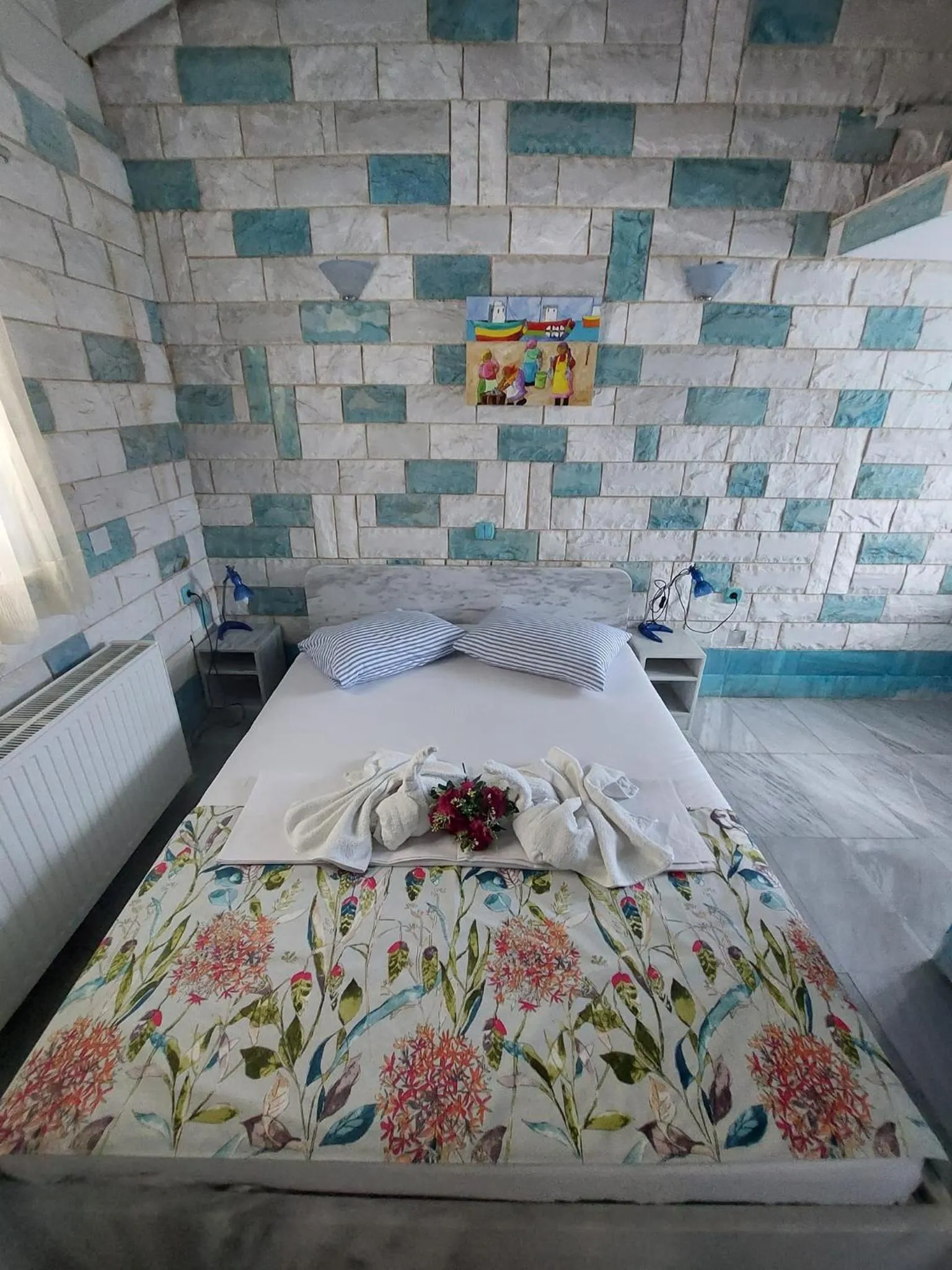 Bed in Paco's Resort Holiday Flats