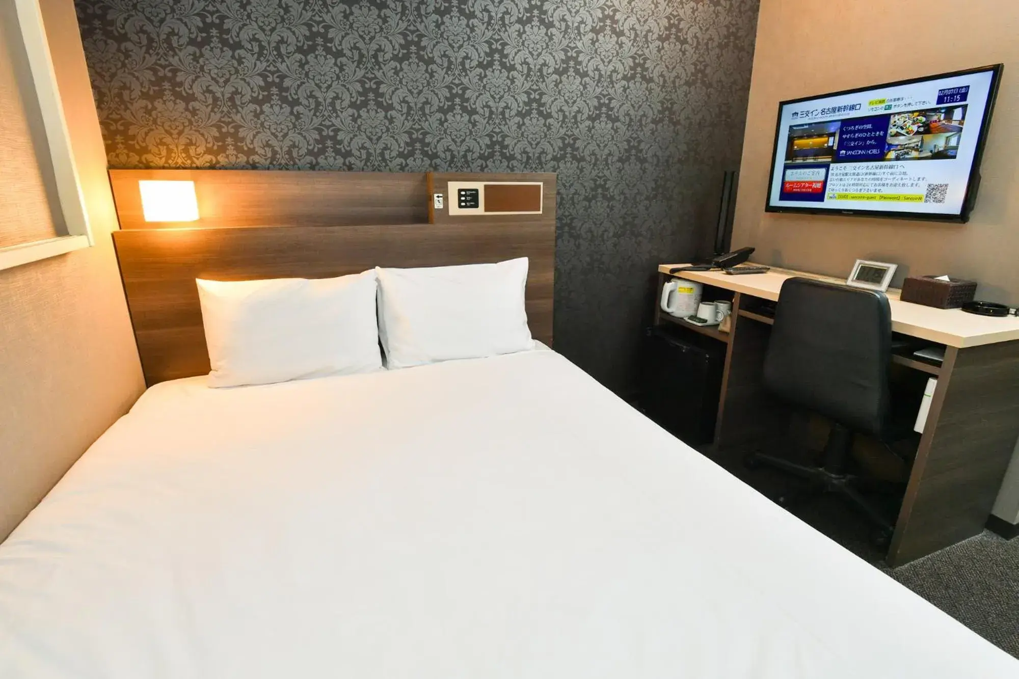 Photo of the whole room, Bed in Sanco Inn Nagoya - Shinkansenguchi Photo of the whole room, Bed in Sanco Inn Nagoya - Shinkansenguchi