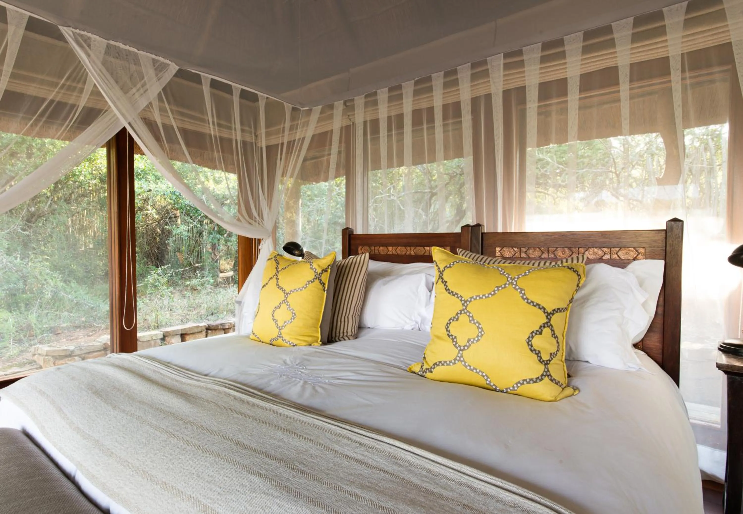 Bed in Pumba Private Game Reserve