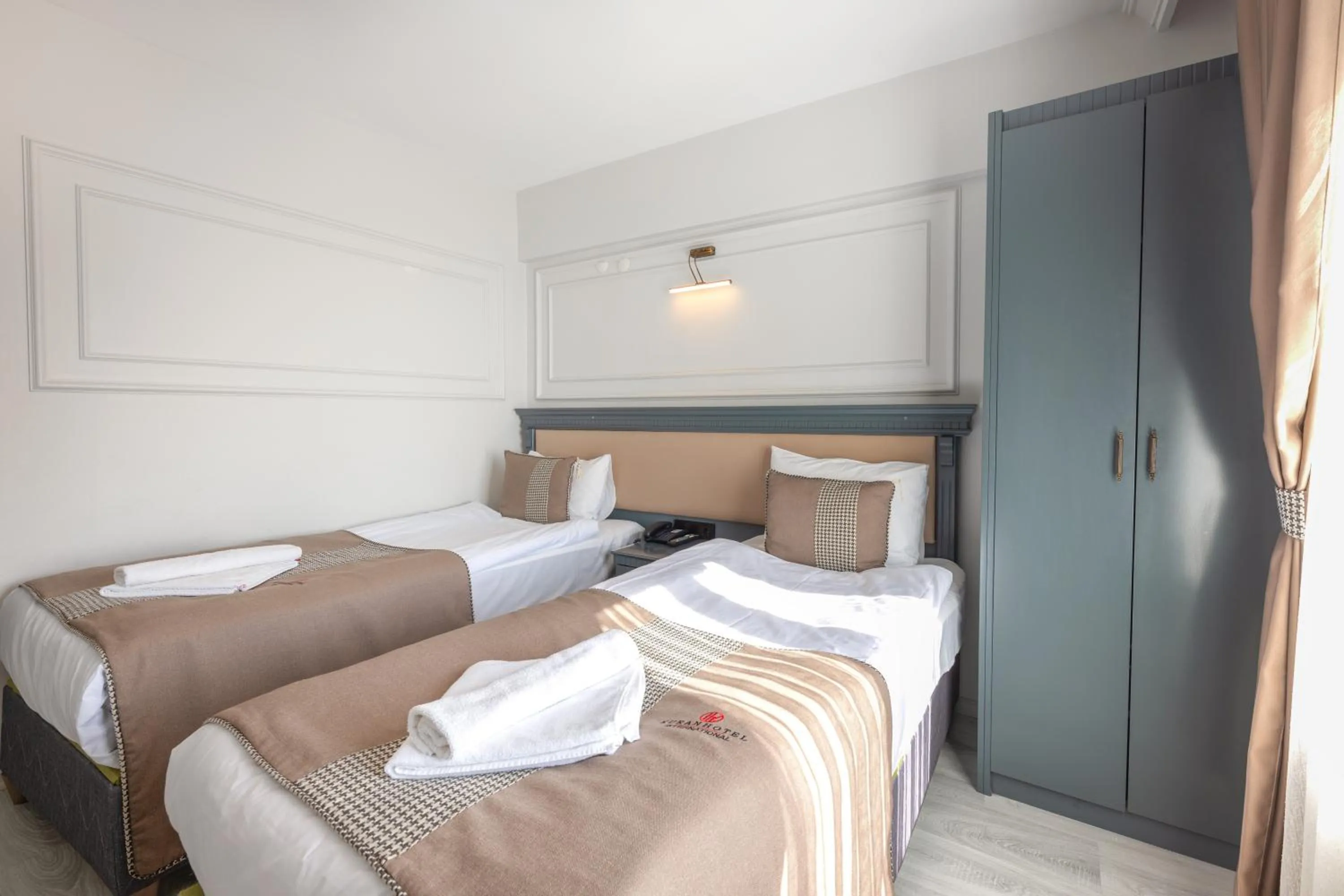 Bed in Kuran Hotel International