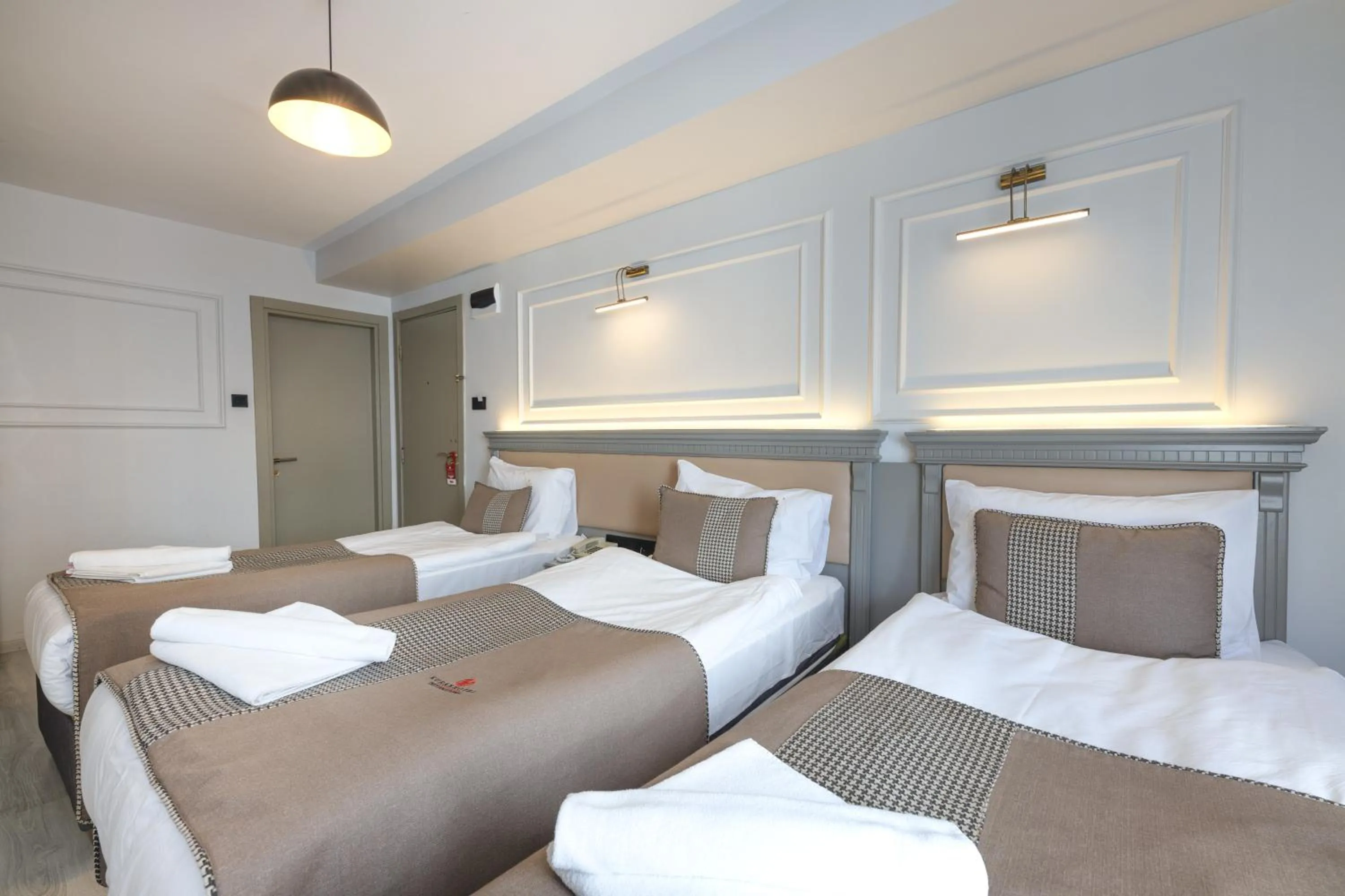 Bed in Kuran Hotel International