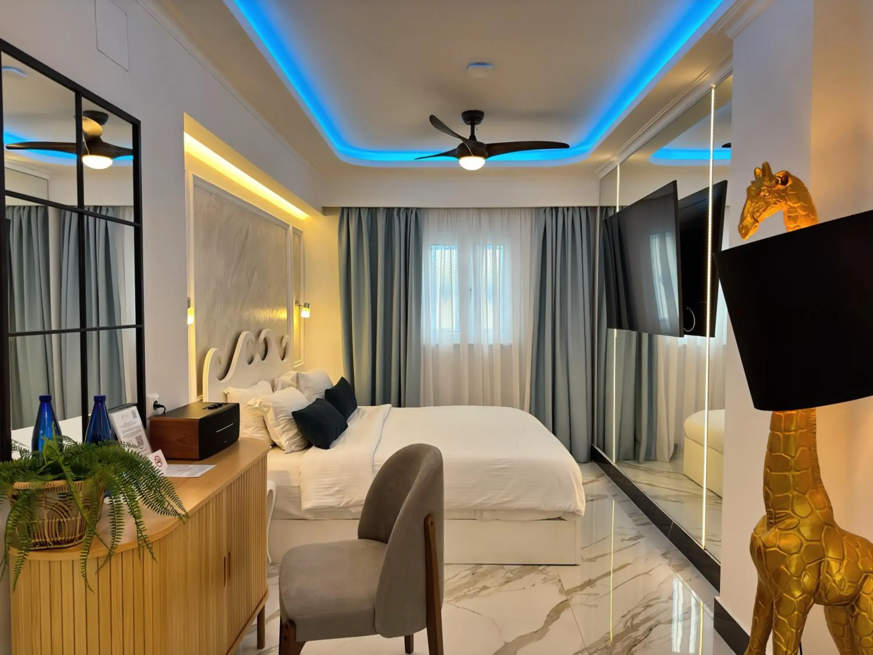 Grand Suite Sea View with Table Fireplace & Indoor Jetted Tub in Panorama Suites & Spa - Adults Only Grand Suite Sea View with Table Fireplace & Indoor Jetted Tub in Panorama Suites & Spa - Adults Only