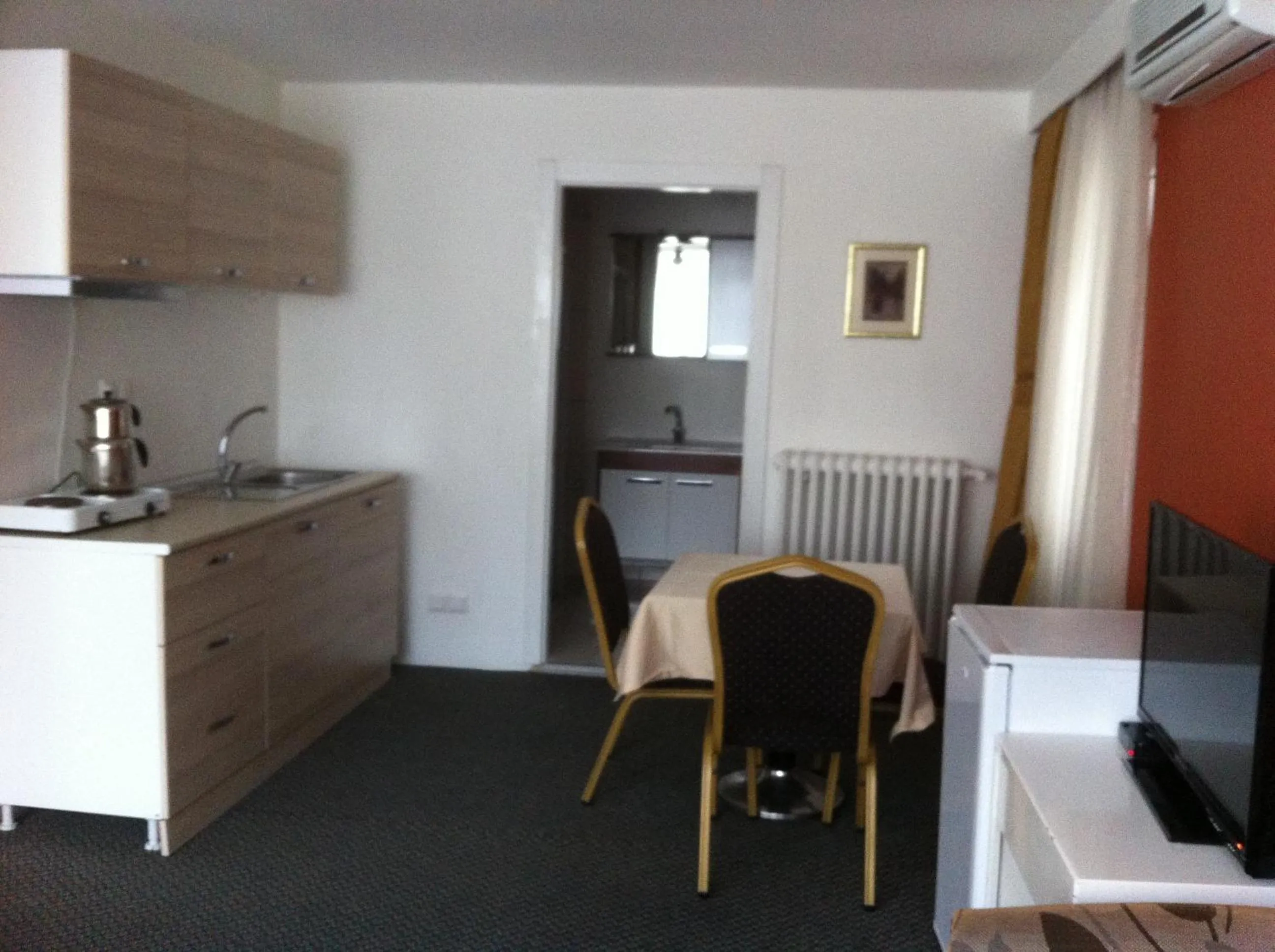 Kitchen or kitchenette in First Apart Hotel