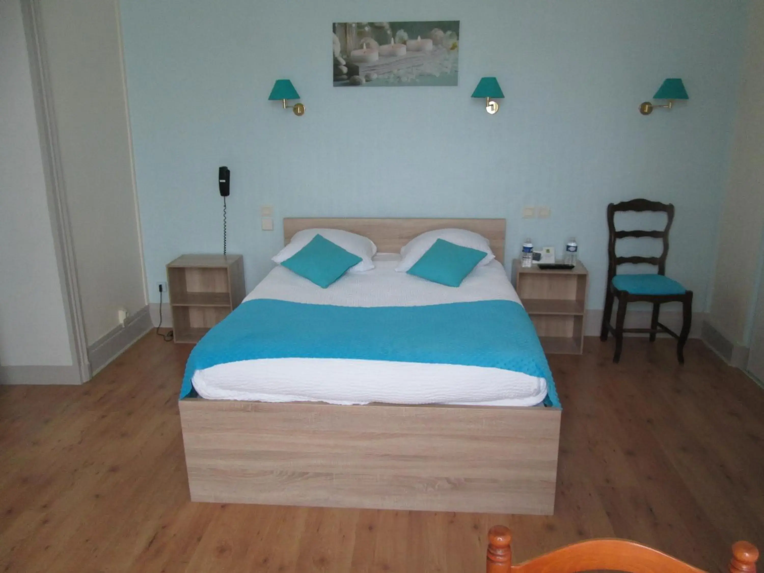 Quadruple Room in Logis Hôtel Beauséjour Quadruple Room in Logis Hôtel Beauséjour