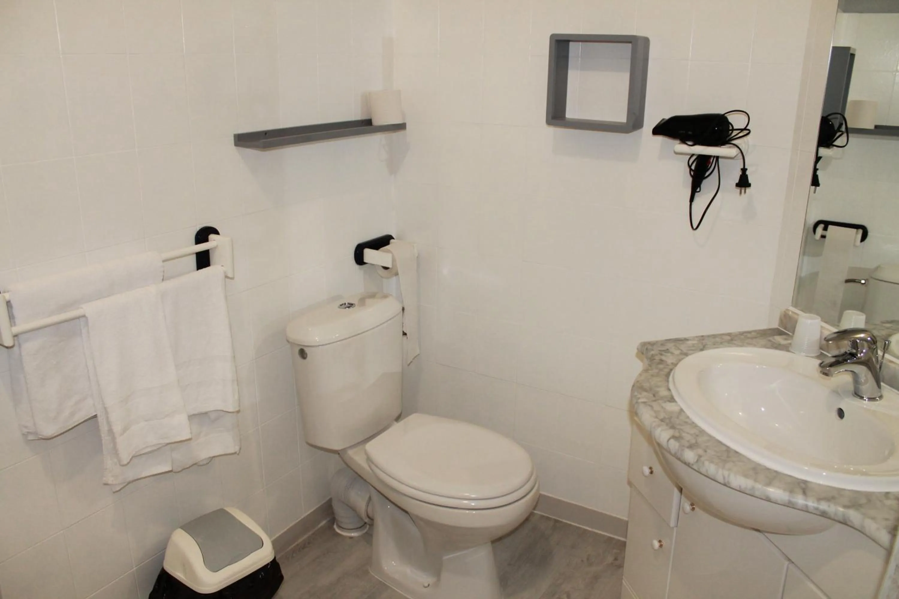 Bathroom in Logis Hôtel Beauséjour