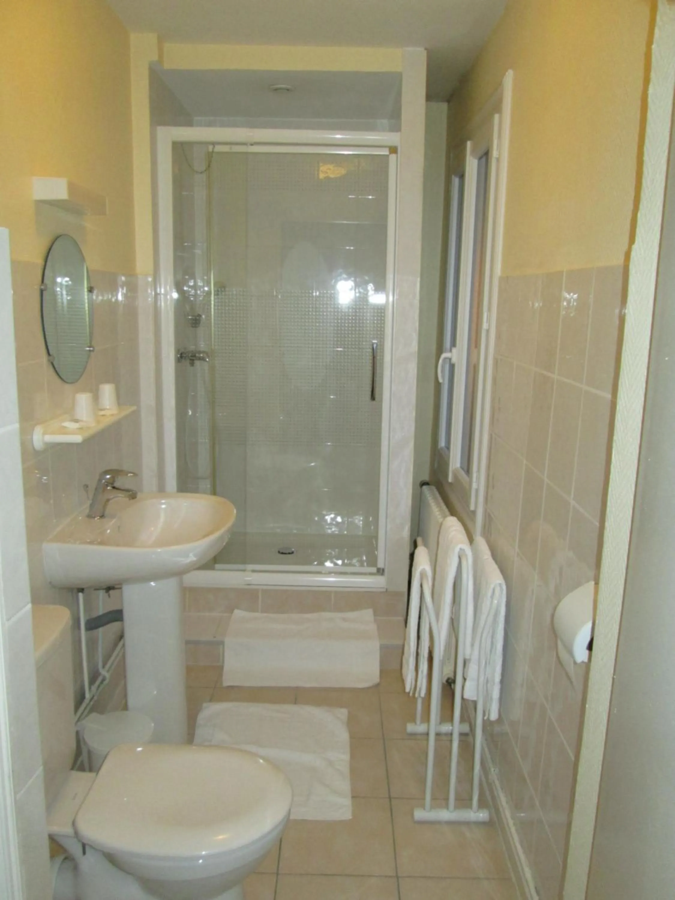 Bathroom in Logis Hôtel Beauséjour