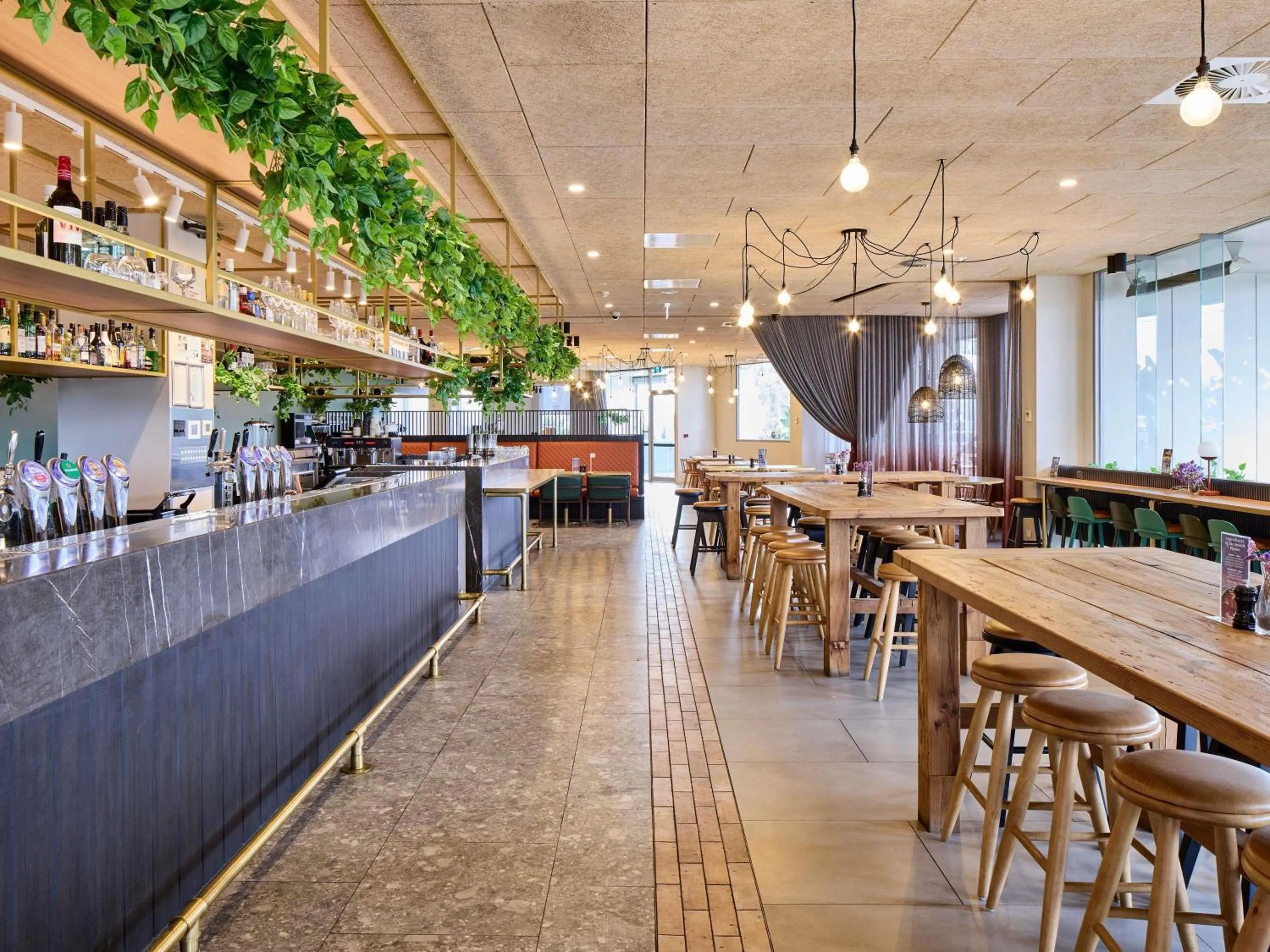 Lounge or bar in Novotel Melbourne Preston