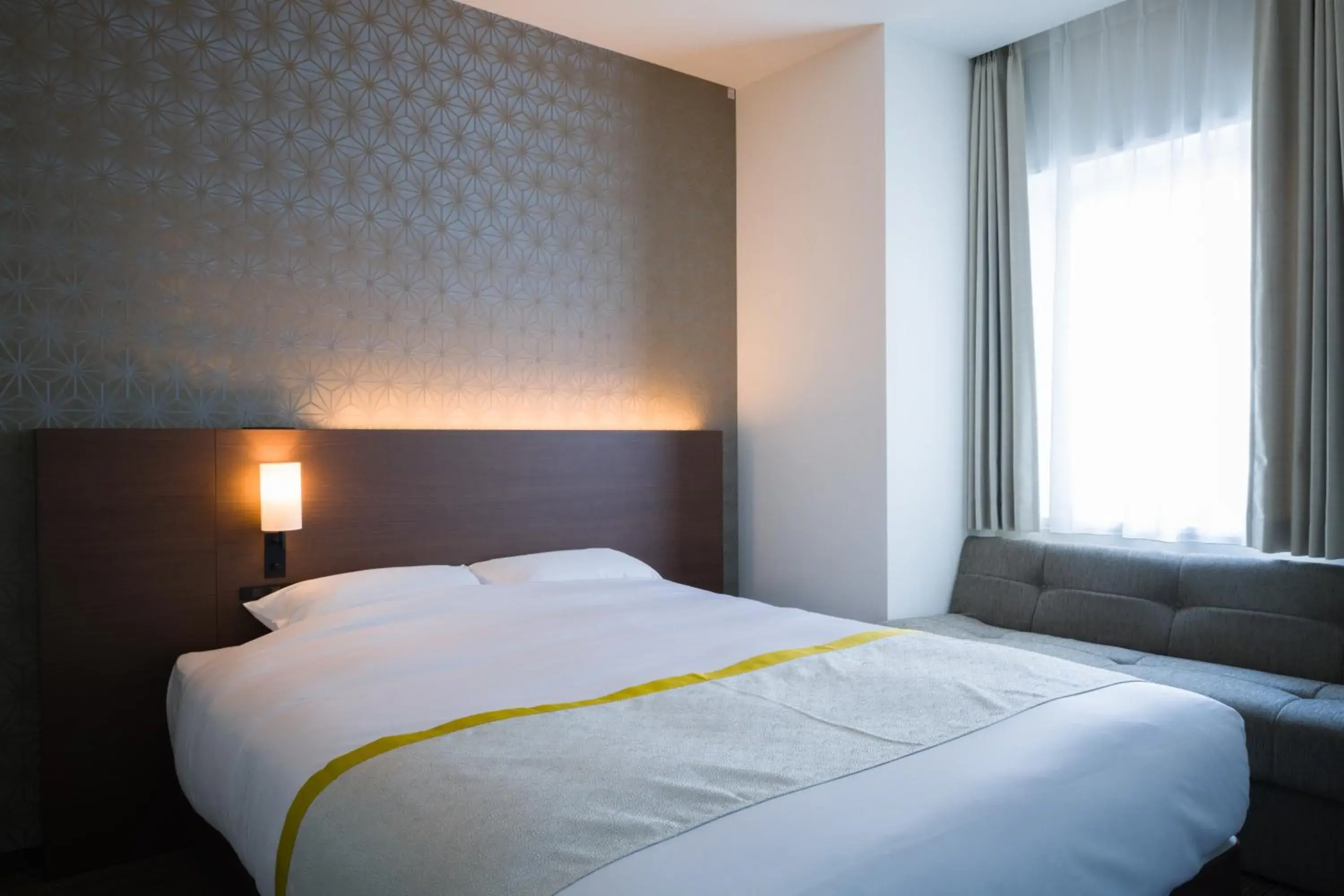 Bed in Tosei Hotel Cocone Ueno Bed in Tosei Hotel Cocone Ueno