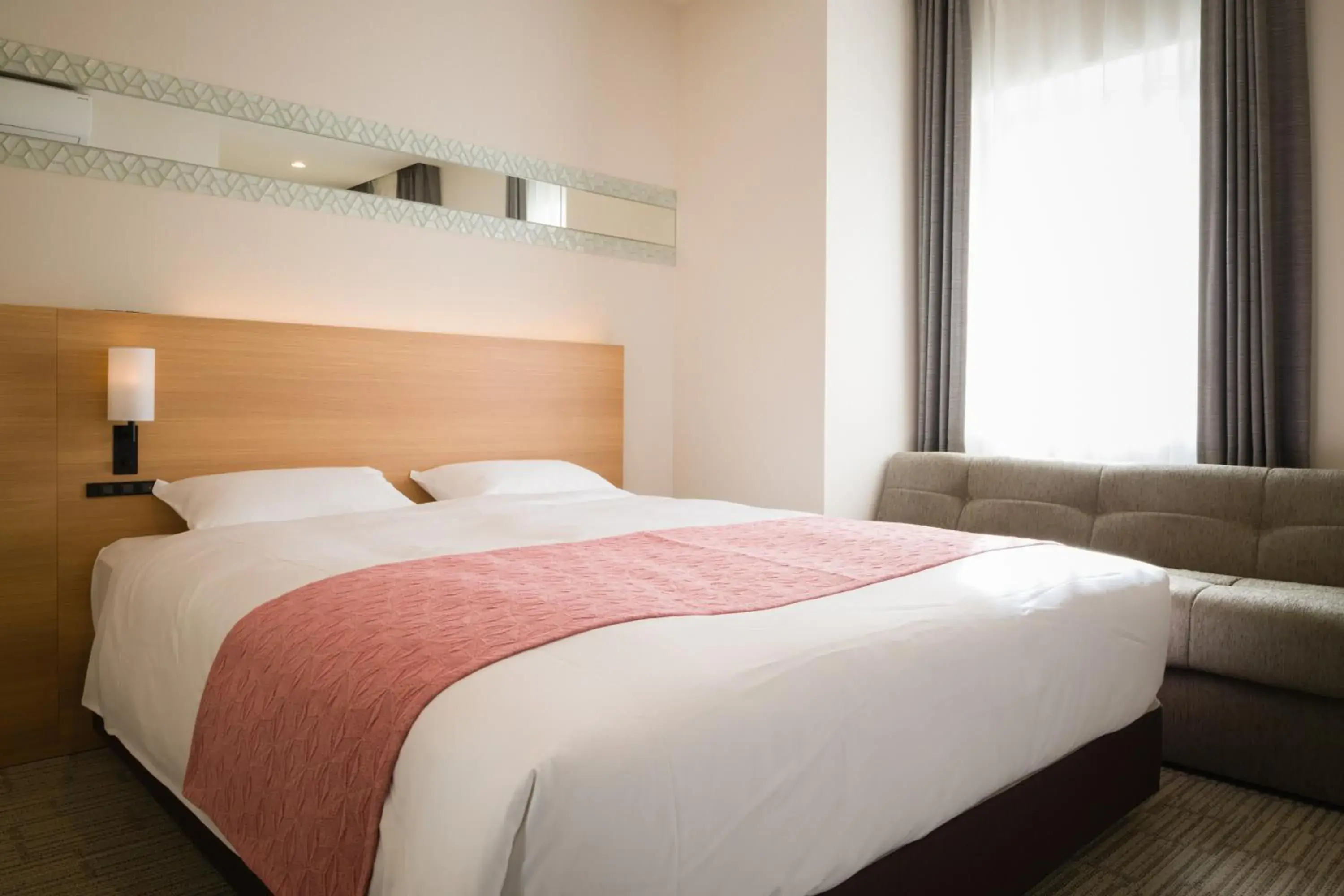 Bed in Tosei Hotel Cocone Ueno Bed in Tosei Hotel Cocone Ueno