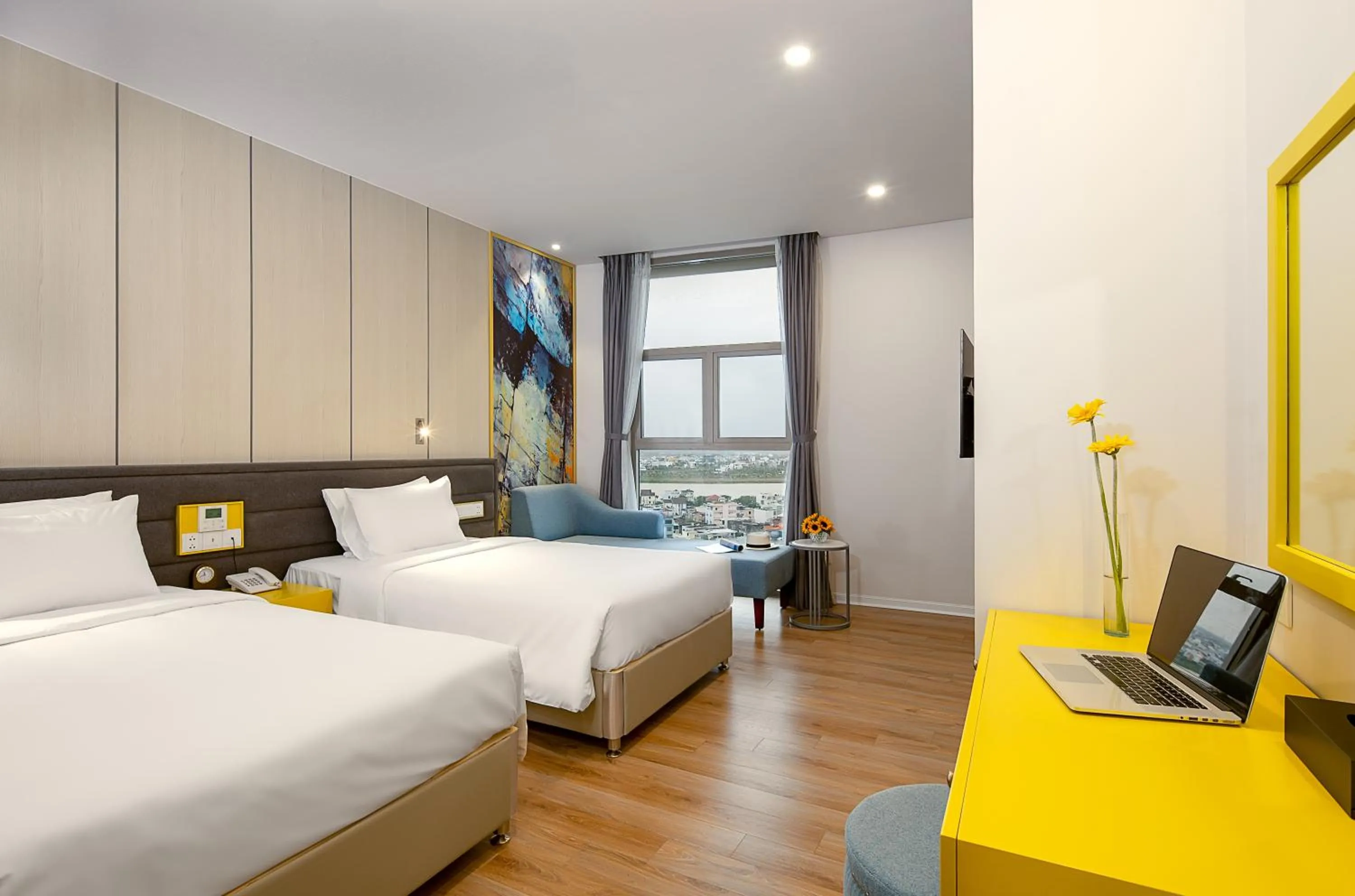 Communal lounge/ TV room, Bed in Grand Citiview Da Nang Hotel