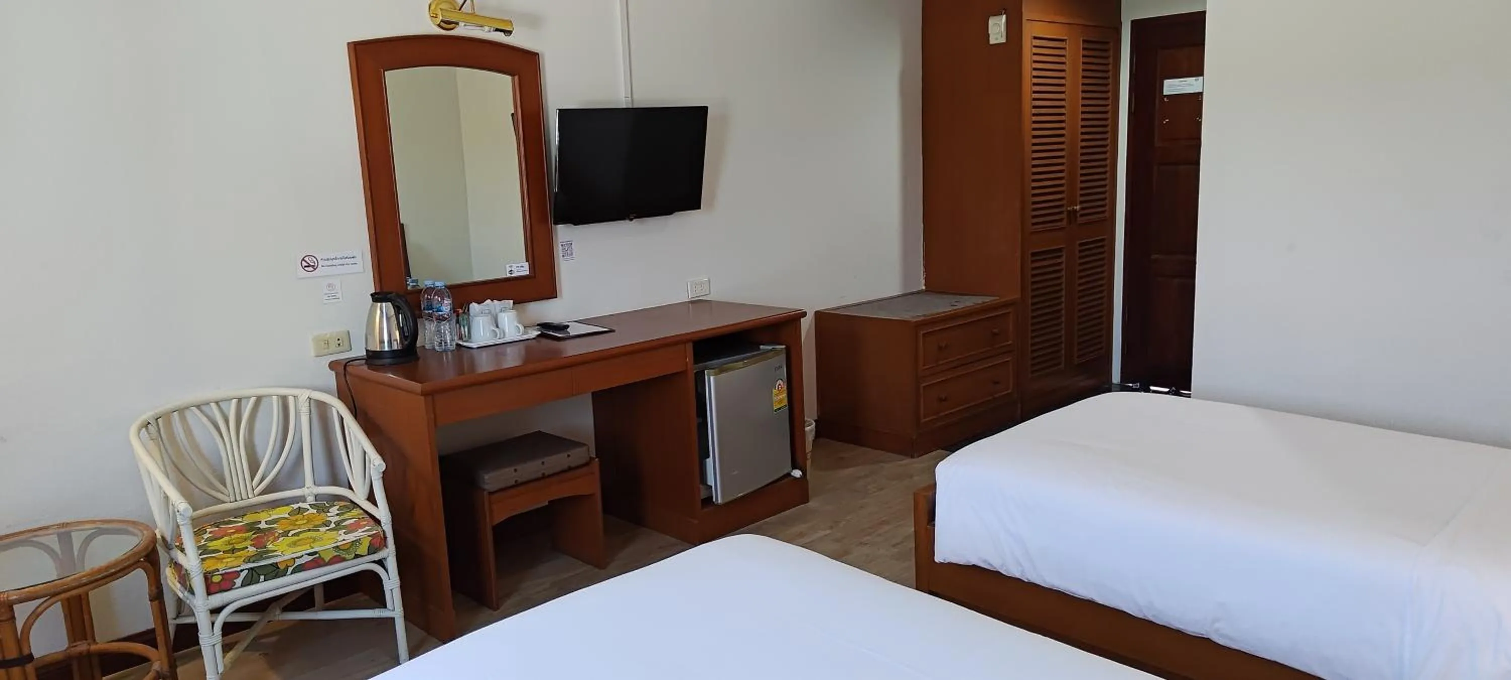 Bed in Puangpen Villa Hotel