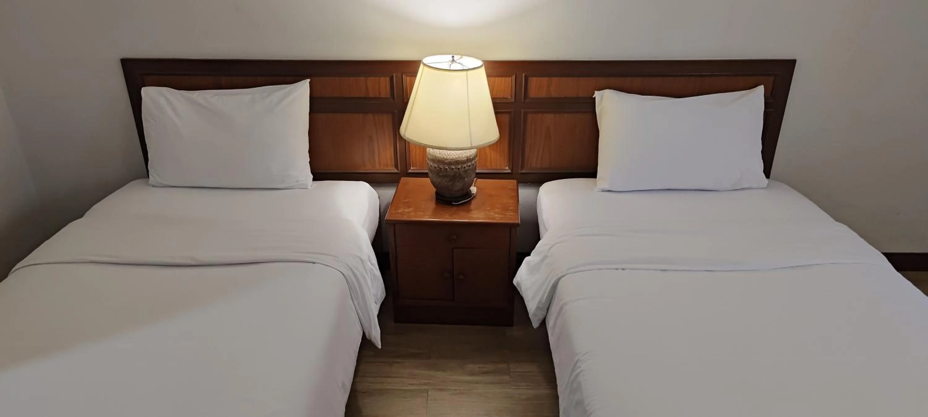 Bed in Puangpen Villa Hotel