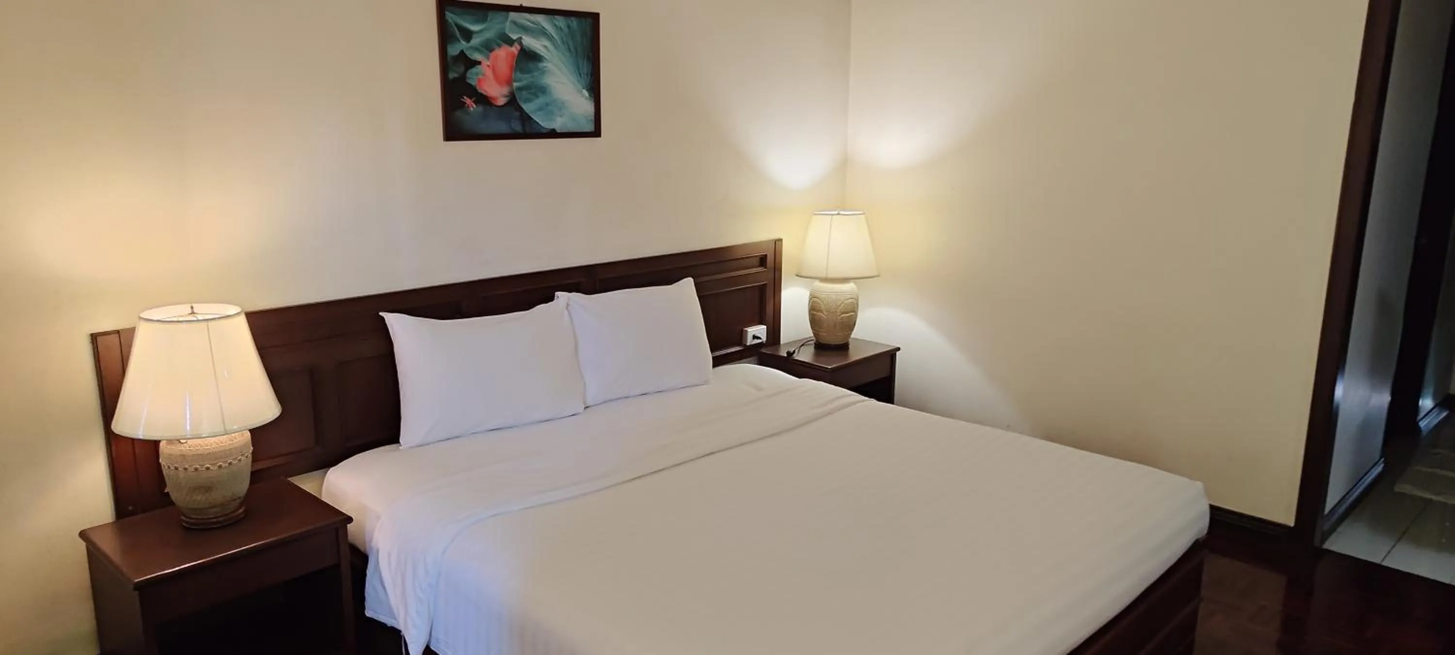 Bed in Puangpen Villa Hotel