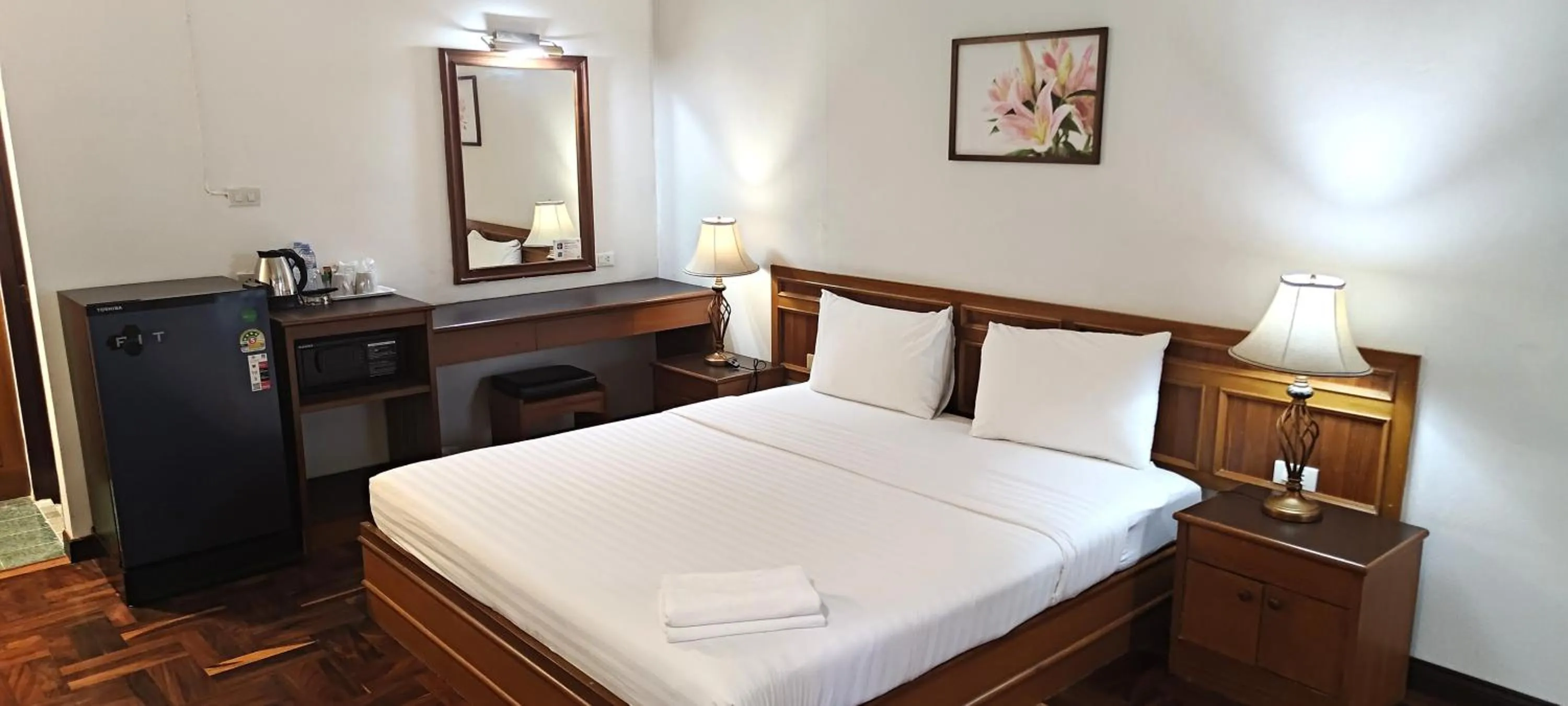 Bed in Puangpen Villa Hotel