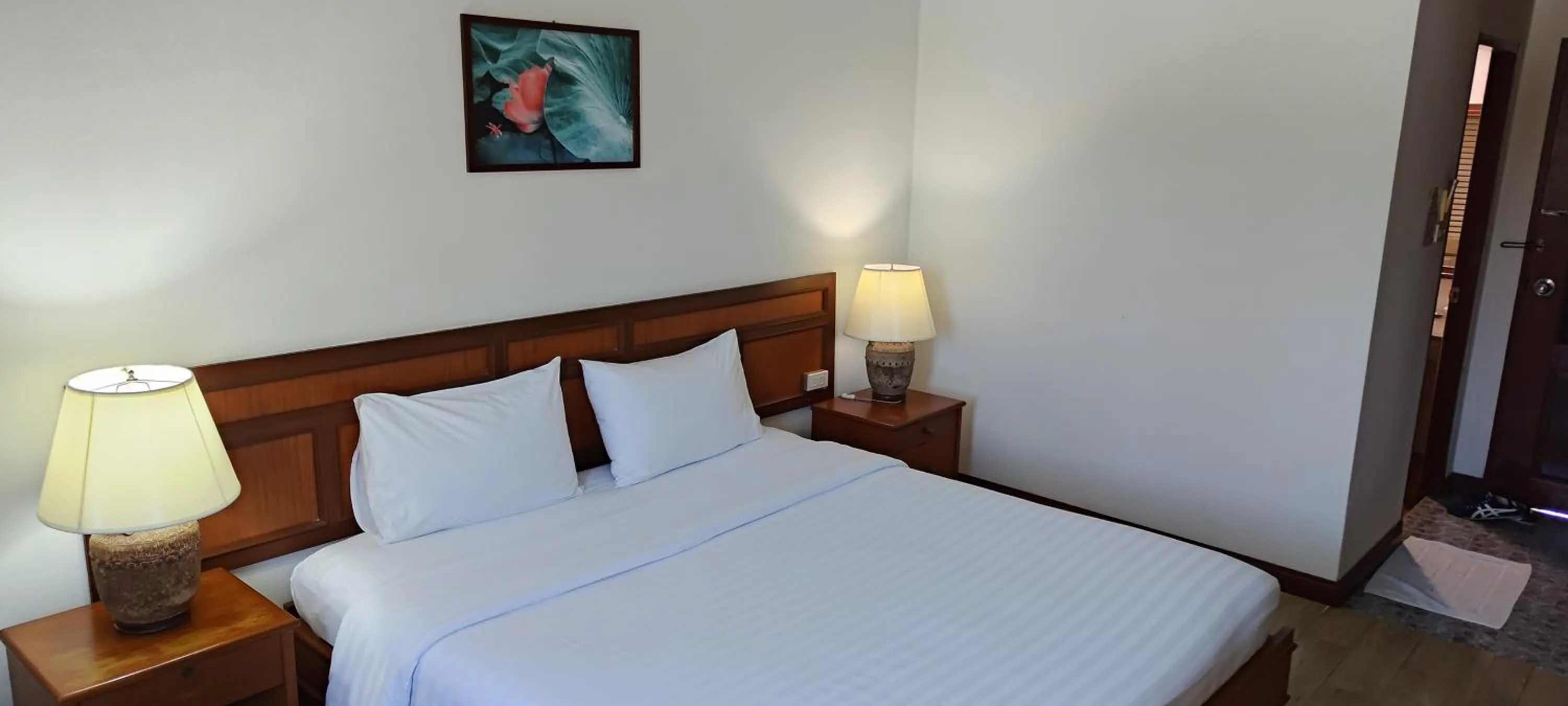 Bed in Puangpen Villa Hotel