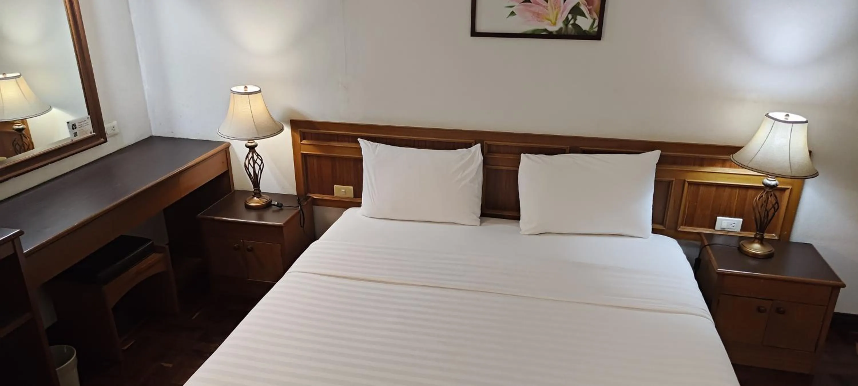 Bed in Puangpen Villa Hotel