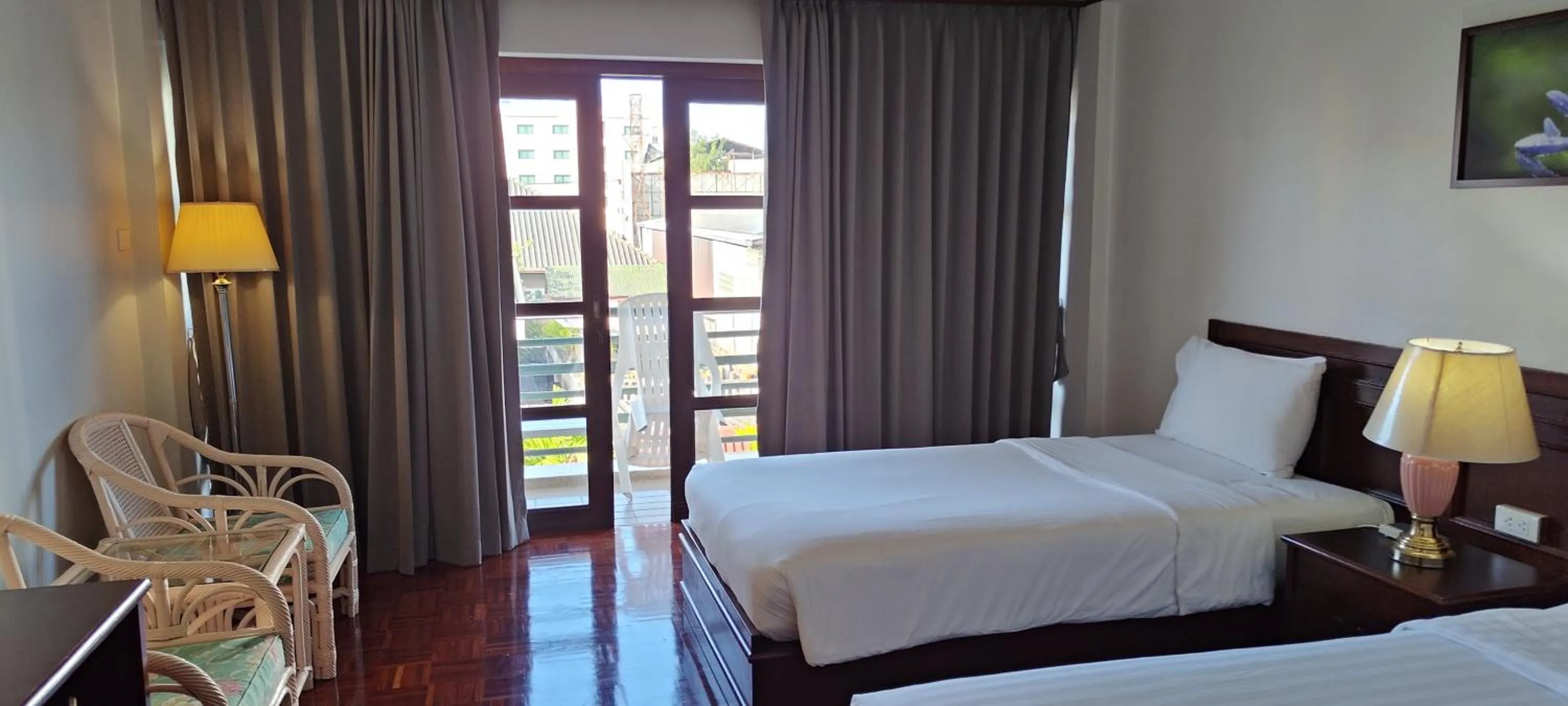 Bed in Puangpen Villa Hotel