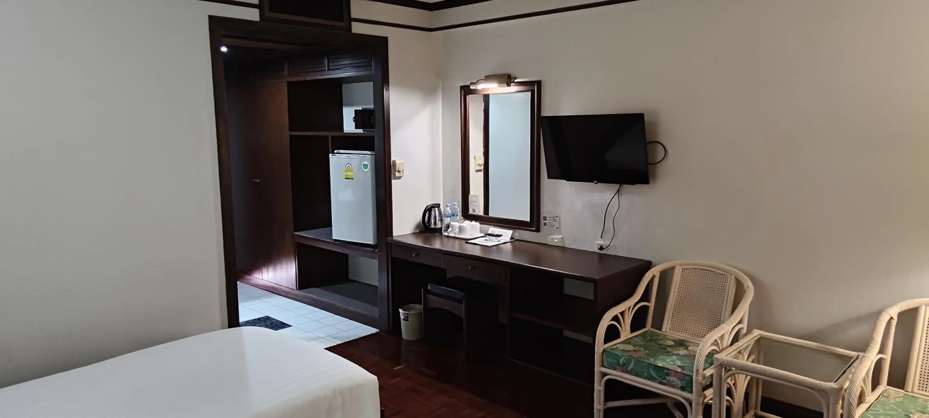 Bed in Puangpen Villa Hotel