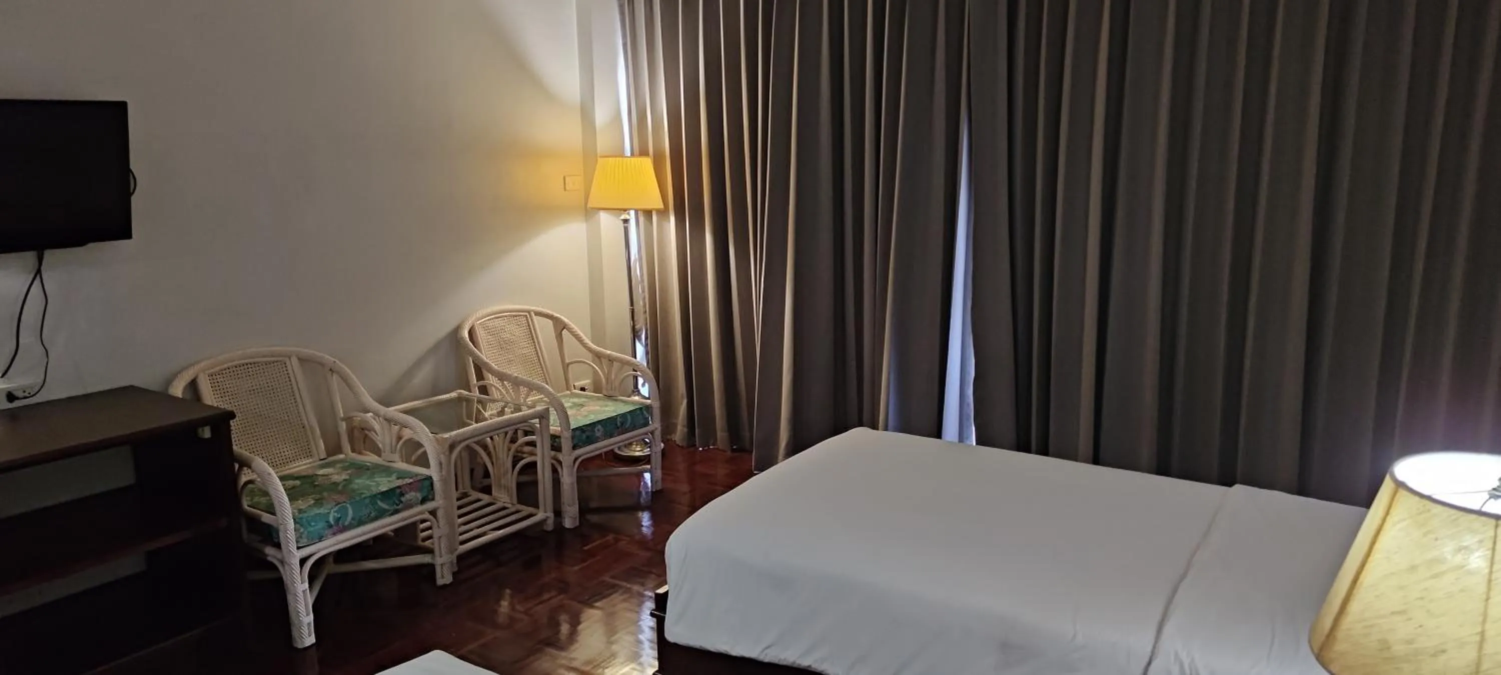 Bed in Puangpen Villa Hotel