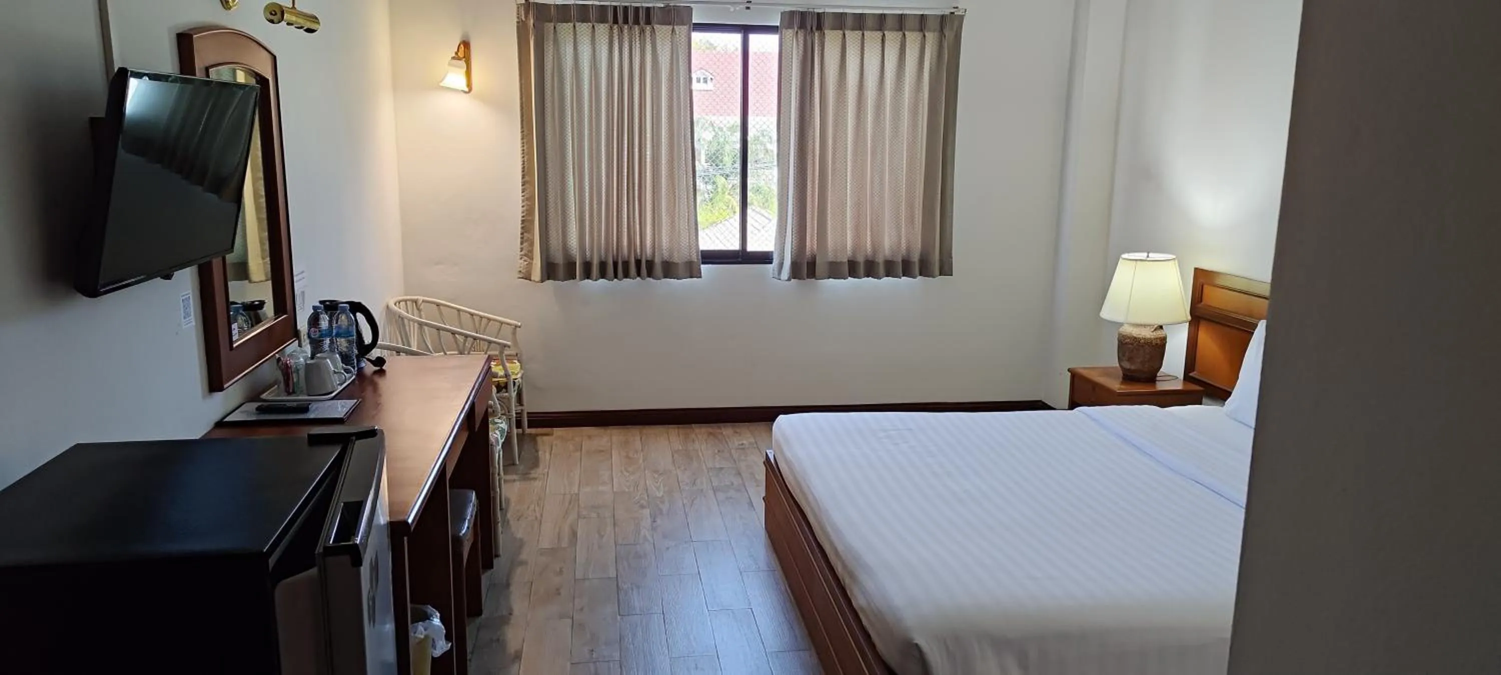 Bed in Puangpen Villa Hotel