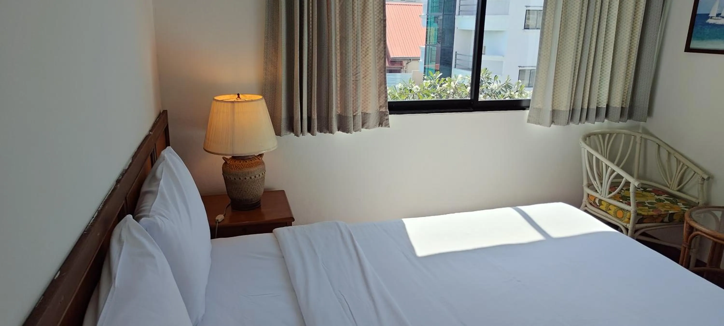 Bed in Puangpen Villa Hotel