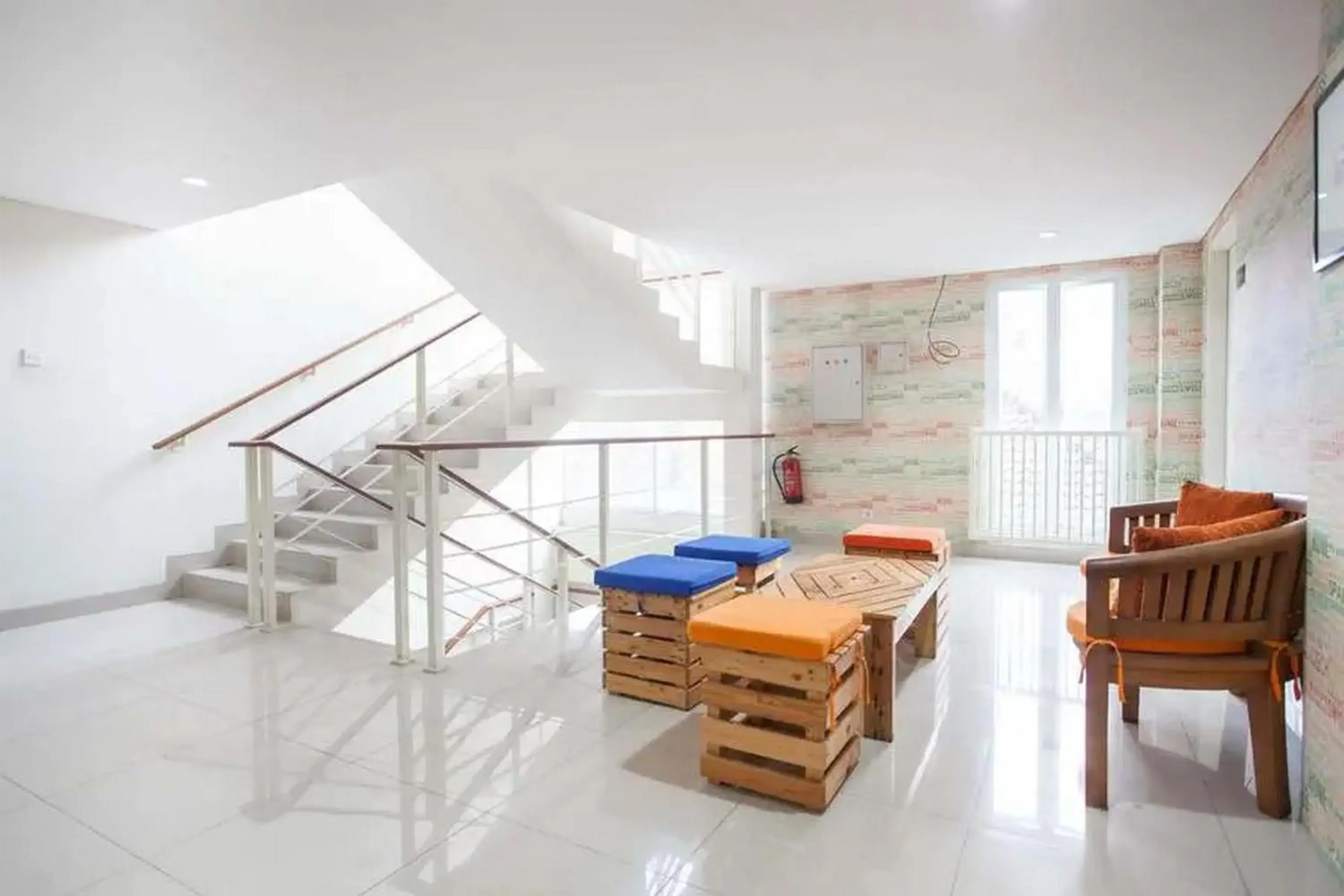 Living room in RedDoorz Plus at Riverside Malang Living room in RedDoorz Plus at Riverside Malang