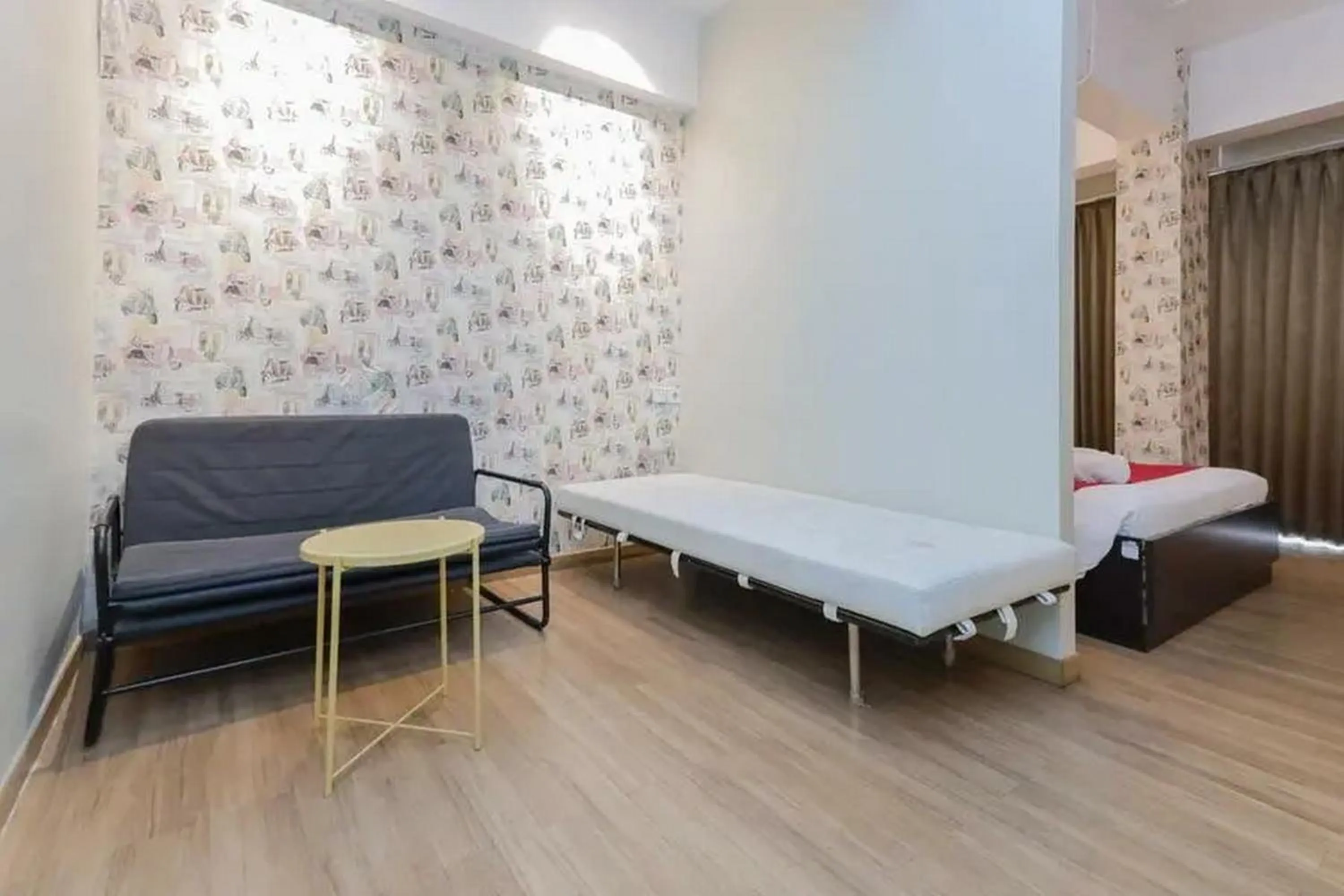 Living room, Bed in RedDoorz Plus at Riverside Malang