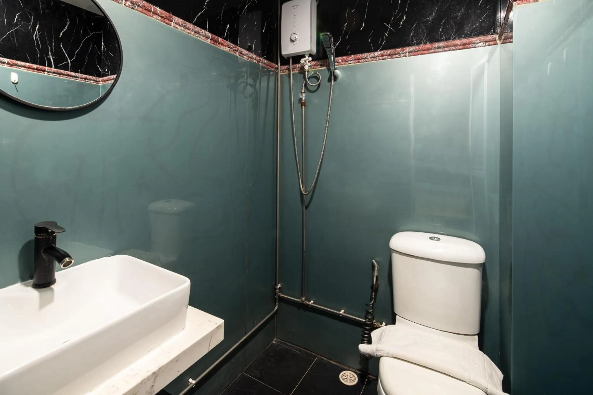 Bathroom in HOTEL JJH Aliwal