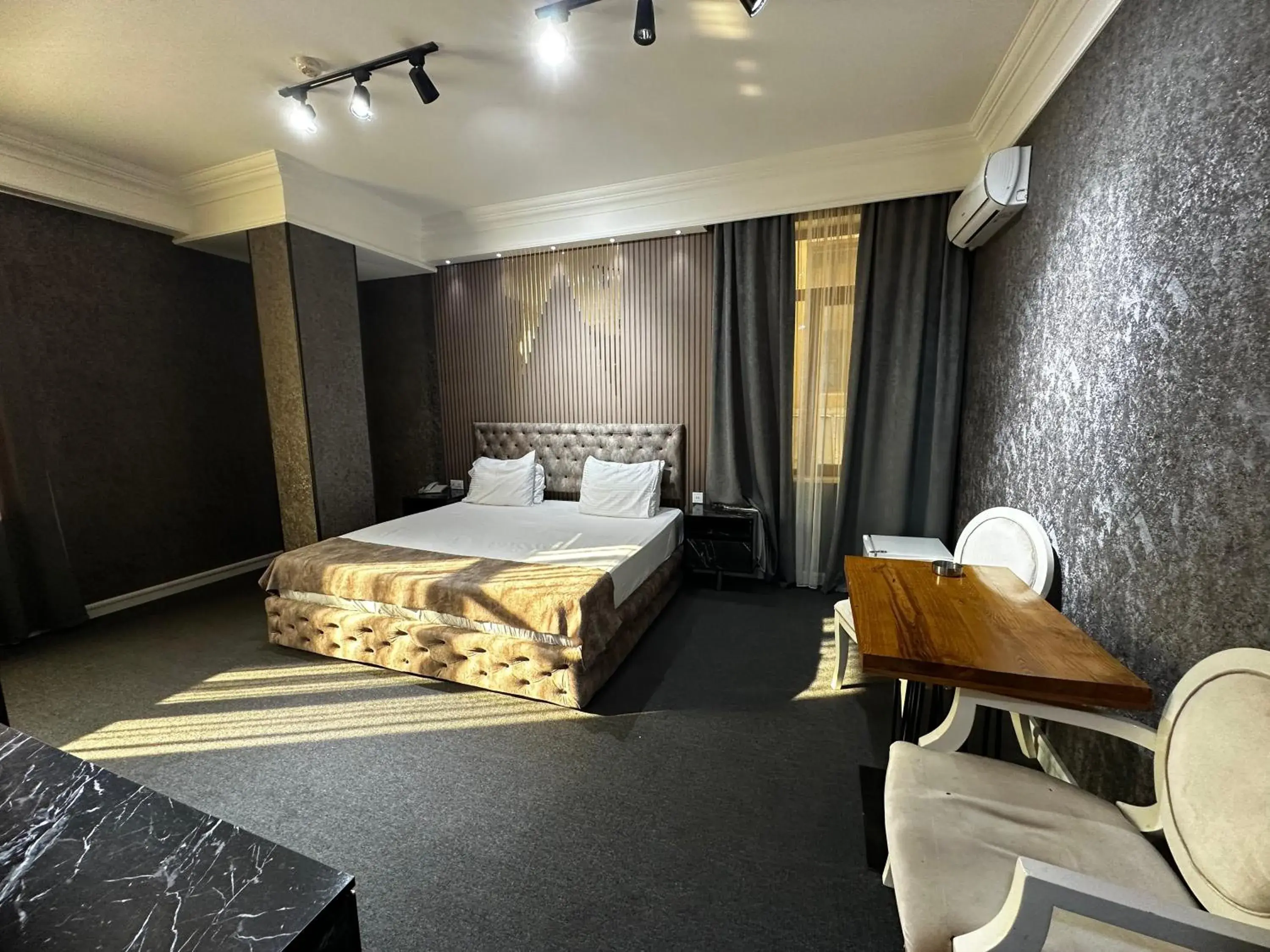 Living room, Bed in Amber Hotel Living room, Bed in Amber Hotel