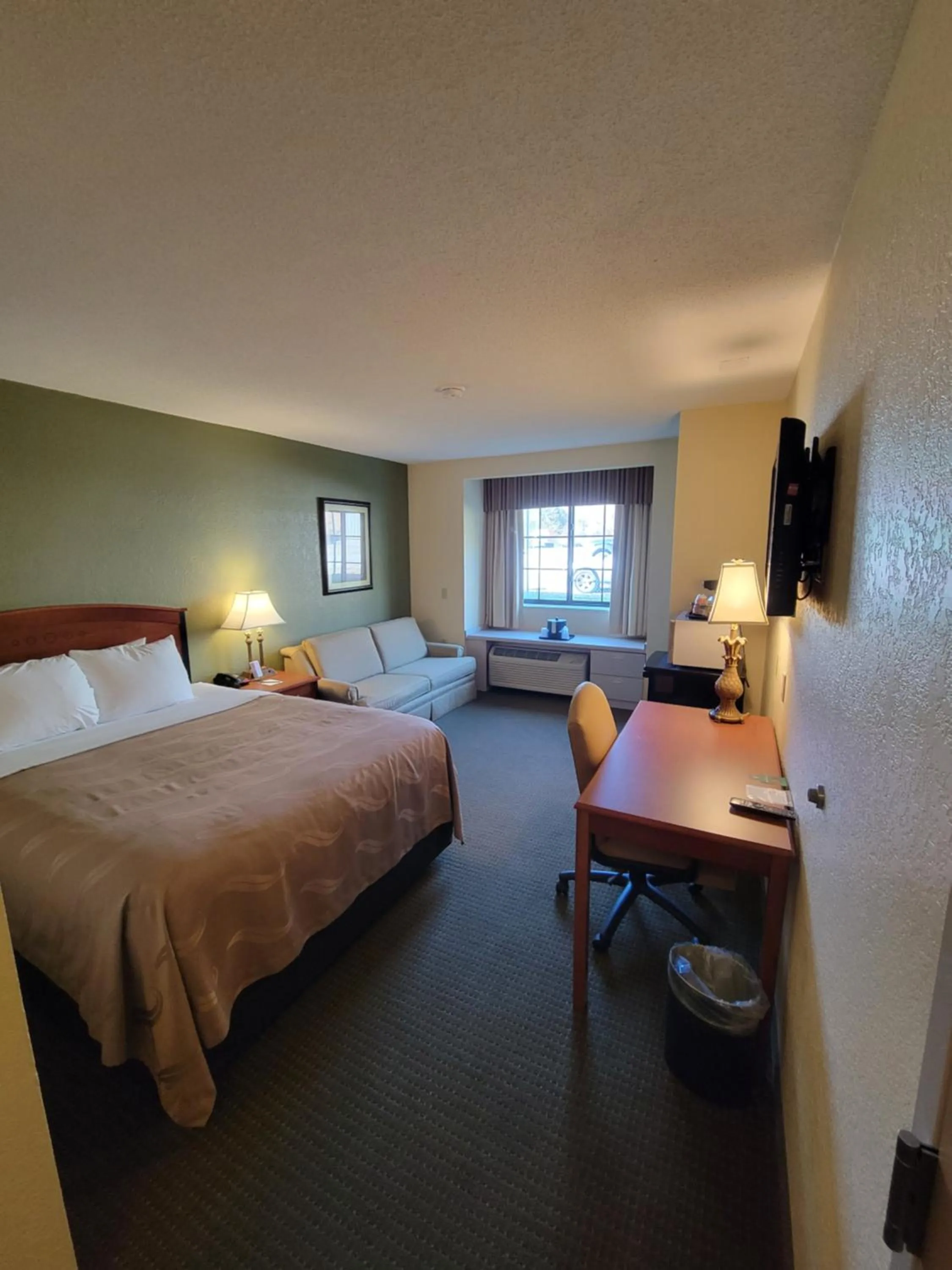 Bedroom, Bed in Quality Inn & Suites Prestonsburg next to Mountain Arts Center