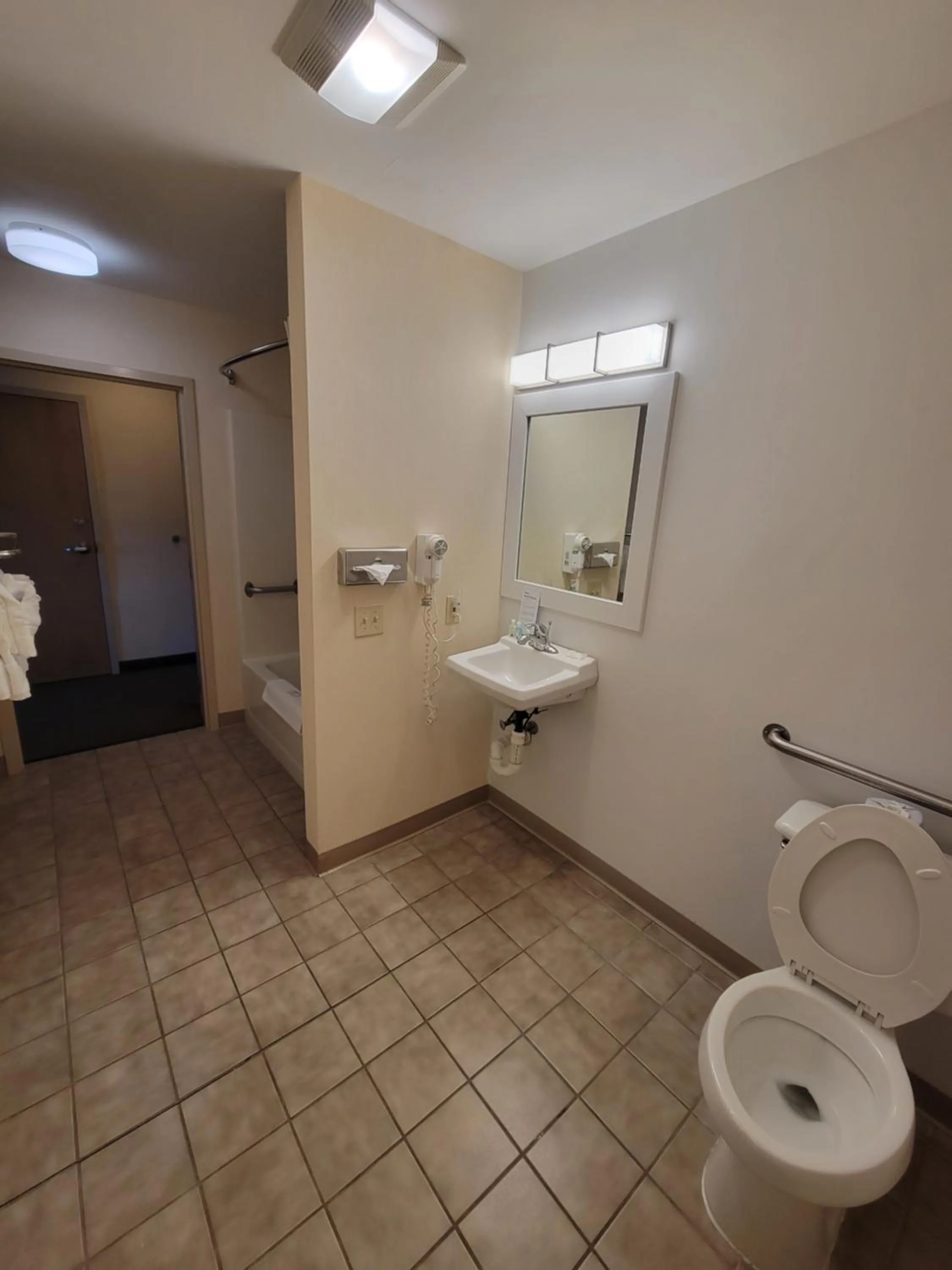 Bathroom in Quality Inn & Suites Prestonsburg next to Mountain Arts Center