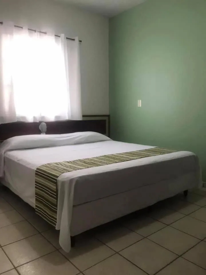 Bed in Princetel Palace Hotel