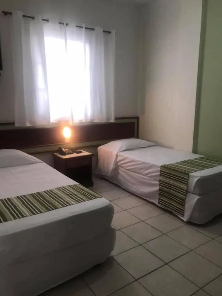 Bed in Princetel Palace Hotel