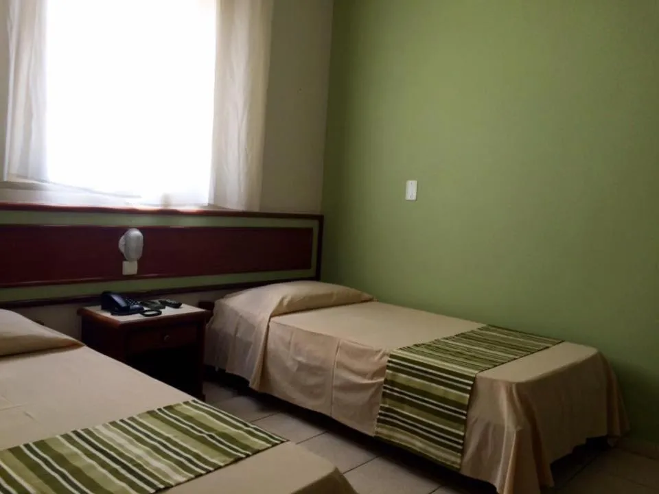 Bed in Princetel Palace Hotel