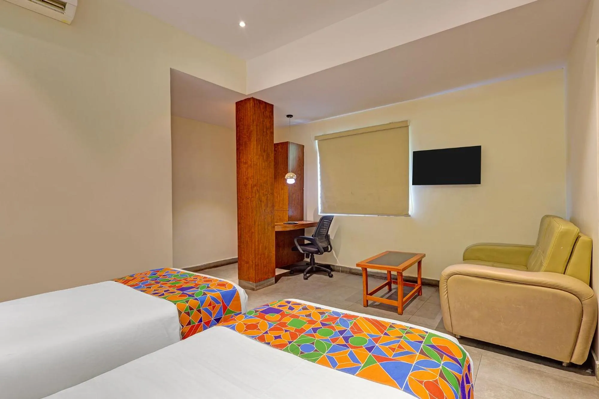 Bed in FabHotel Siddarth Grand