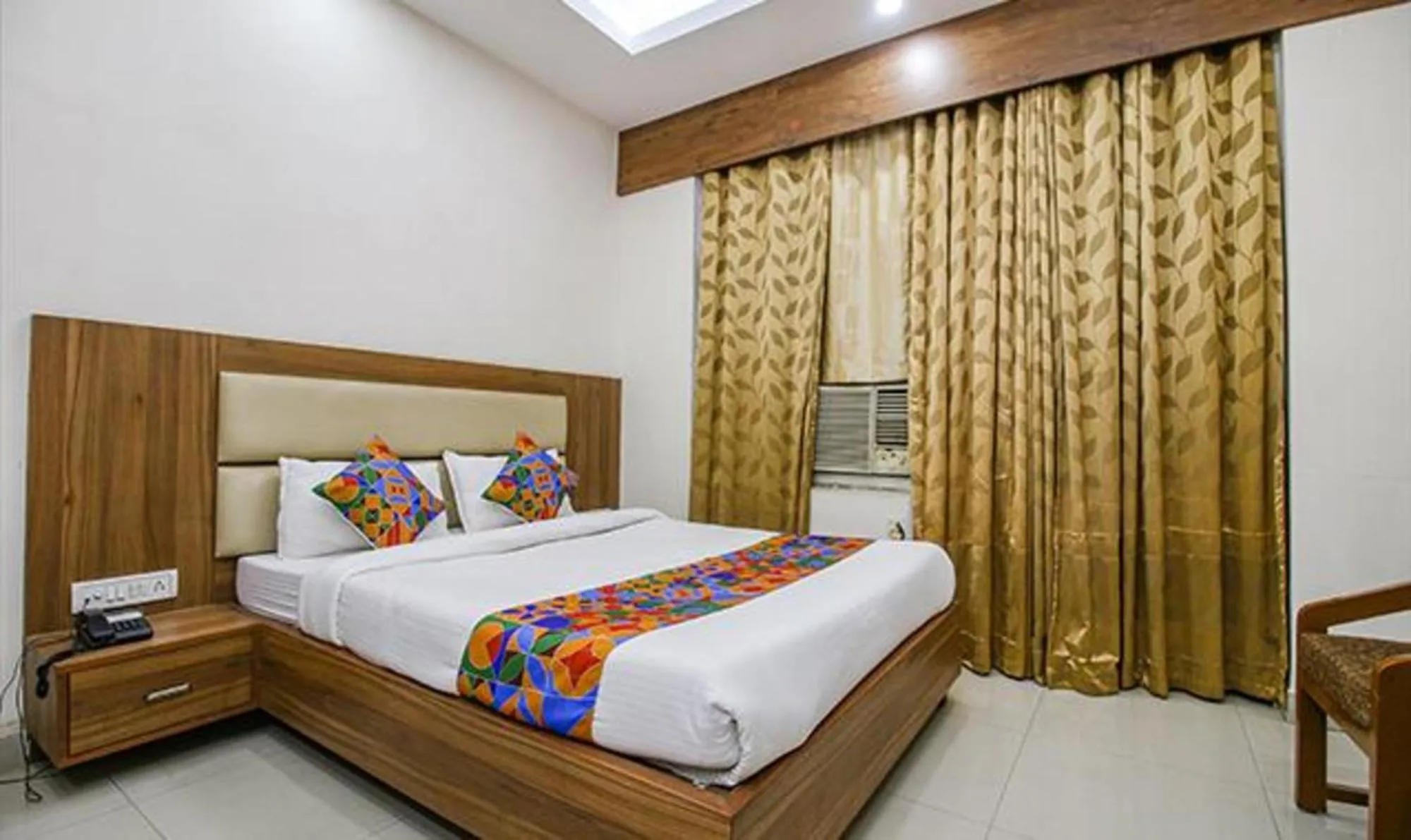 Bed in FabHotel Silver Inn I