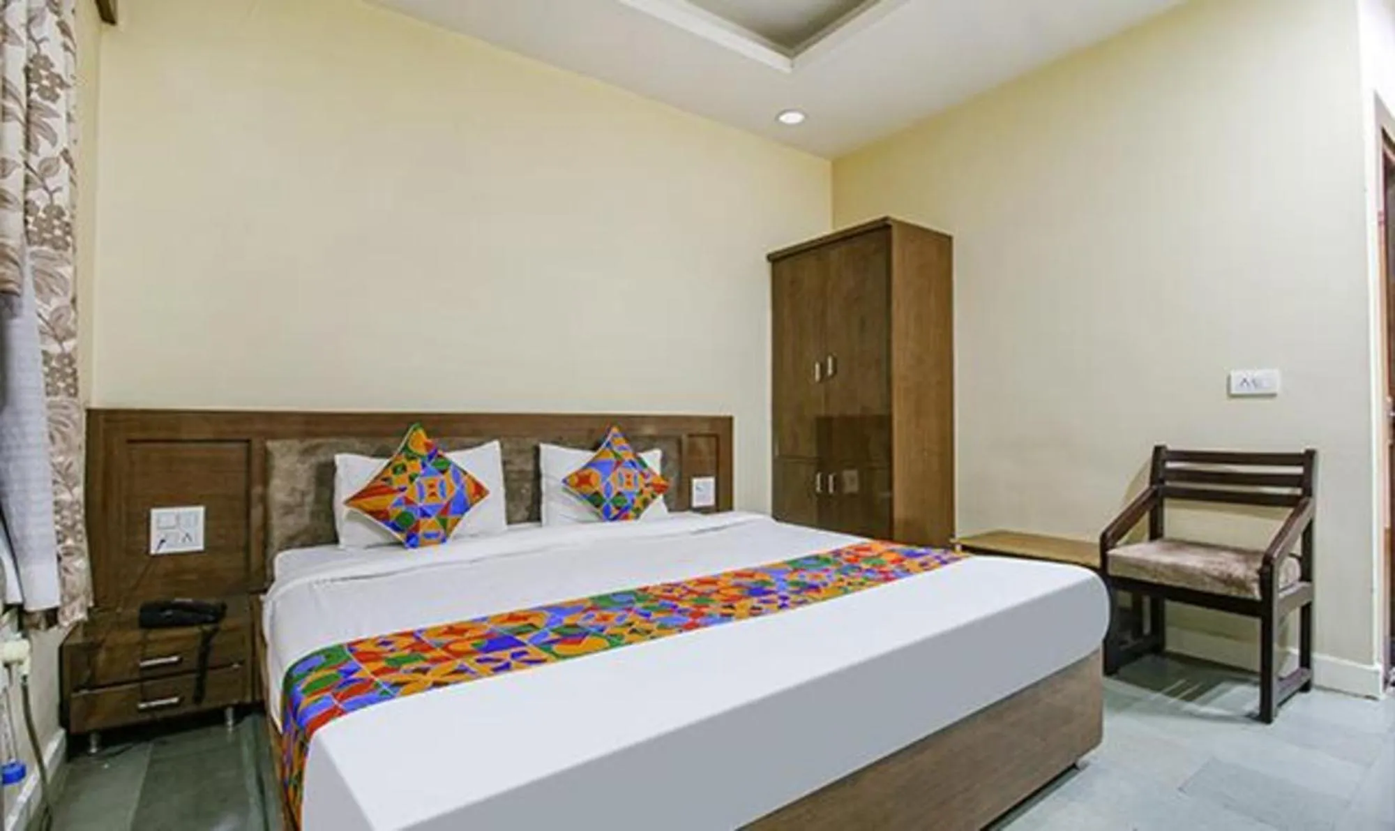 Bed in FabHotel Silver Inn I