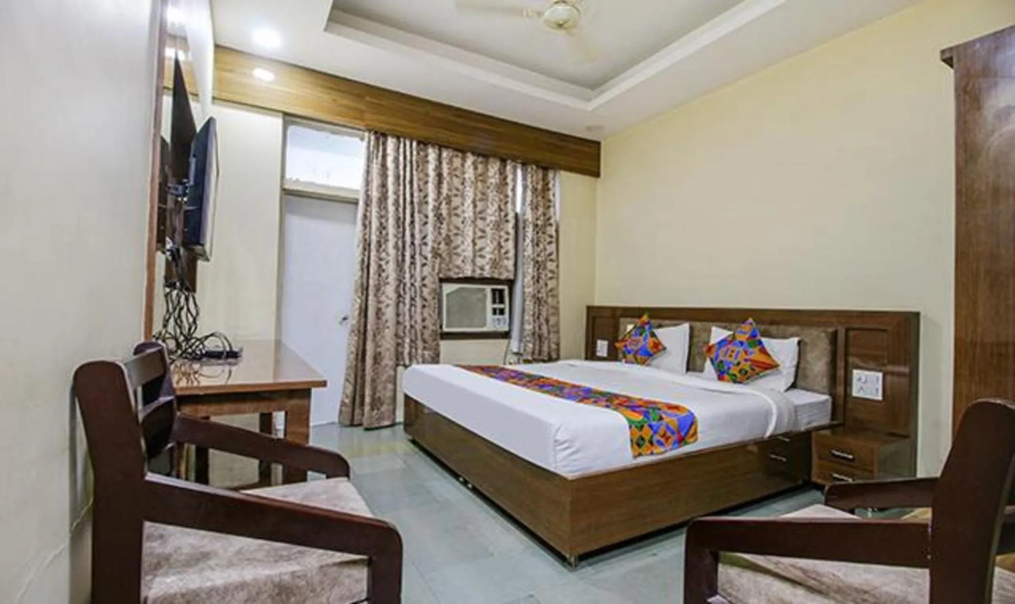 Bed in FabHotel Silver Inn I